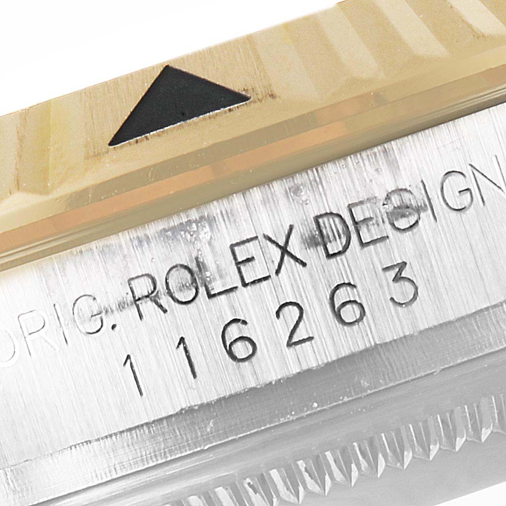 The image shows a close-up view of the bezel and case engraving of a Rolex Turn-o-Graph 116263 Men
s Steel and Gold (two tone) Grey Dial 116263 Men
s Steel and Gold (two tone) Grey Dial watch.
