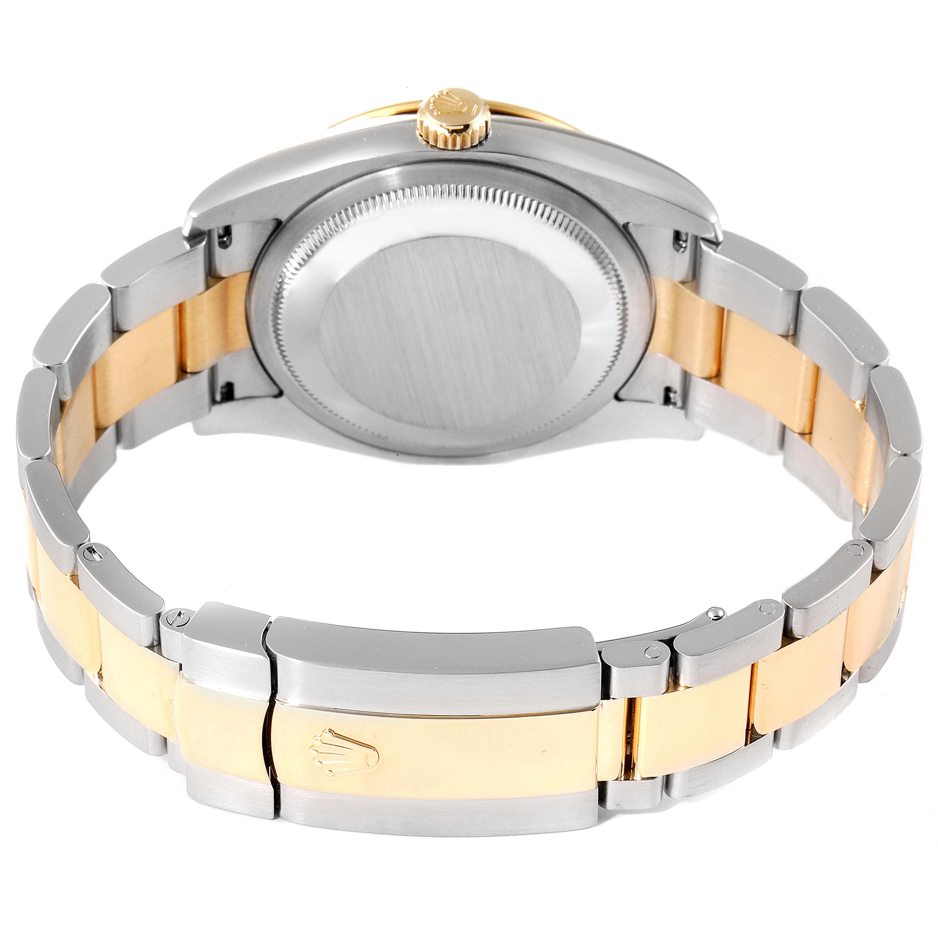 The image shows the back view of the Rolex Turn-o-Graph 116263 Men
s Steel and Gold (two tone) Grey Dial 116263 Men
s Steel and Gold (two tone) Grey Dial watch, highlighting its case back, crown, and two-tone bracelet.