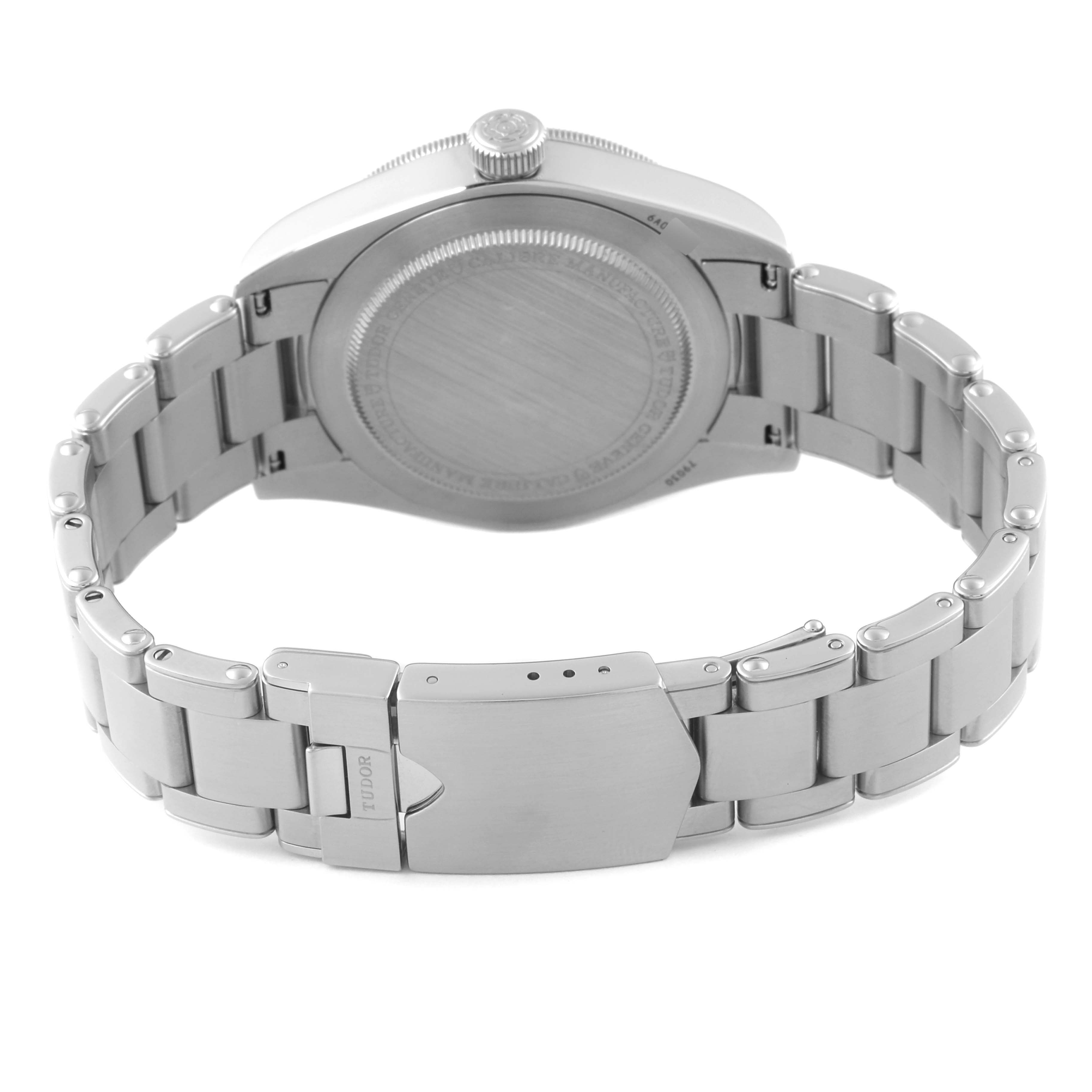 The image shows the back view of the Tudor Heritage Black Bay 79030 Men's Stainless Steel Blue Dial 79030 Men's Stainless Steel Blue Dial watch, highlighting its case back, crown, and bracelet.