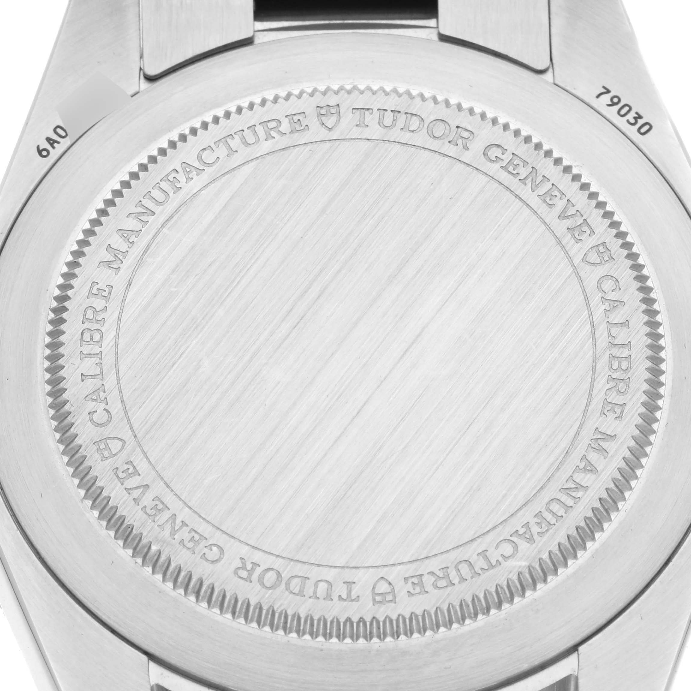 The image shows the back case of the Tudor Heritage Black Bay 79030 Men's Stainless Steel Blue Dial 79030 Men's Stainless Steel Blue Dial watch, displaying the engraving and model number.