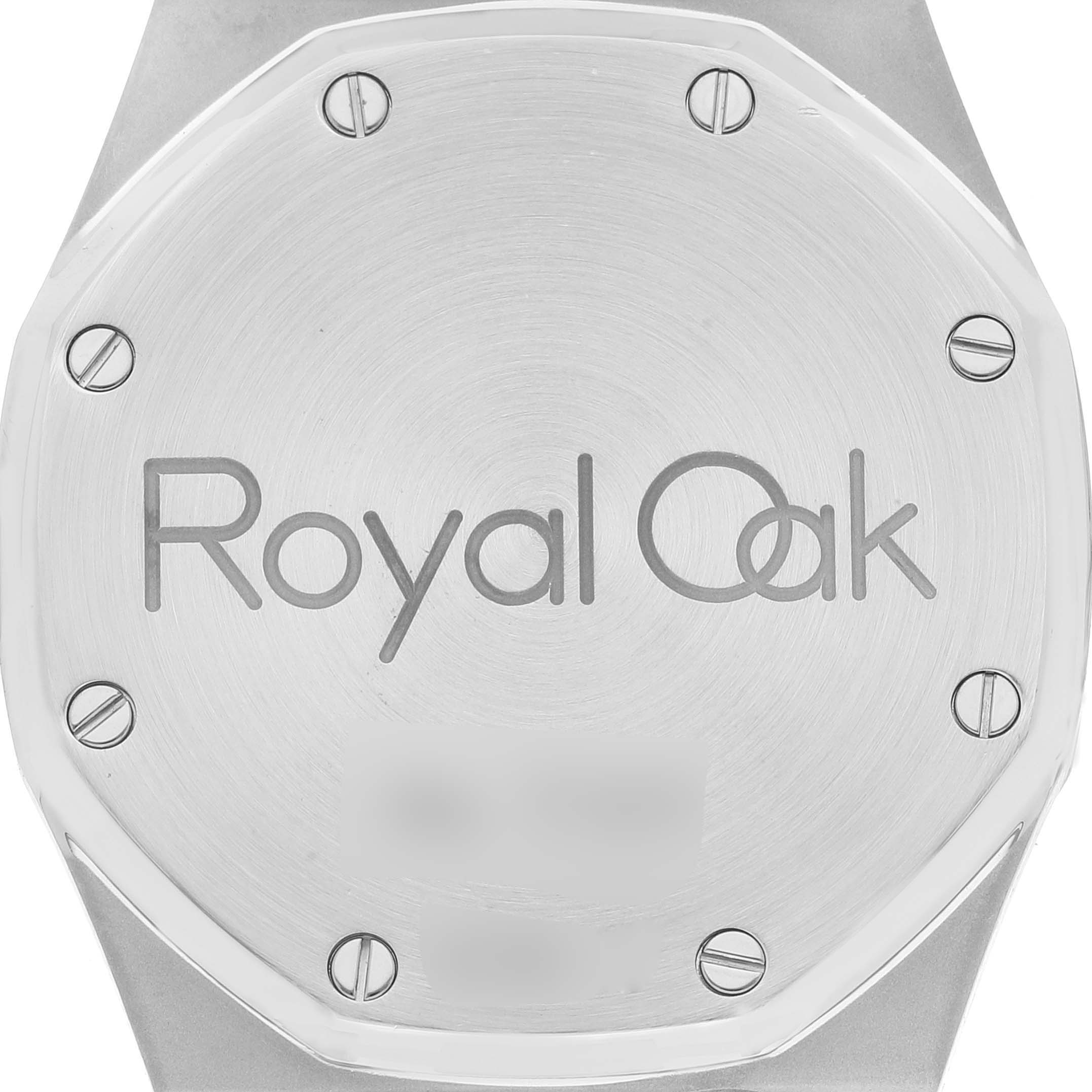 This image shows the case back of the Royal Oak model by Audemars Piguet, featuring its signature logo and screws.