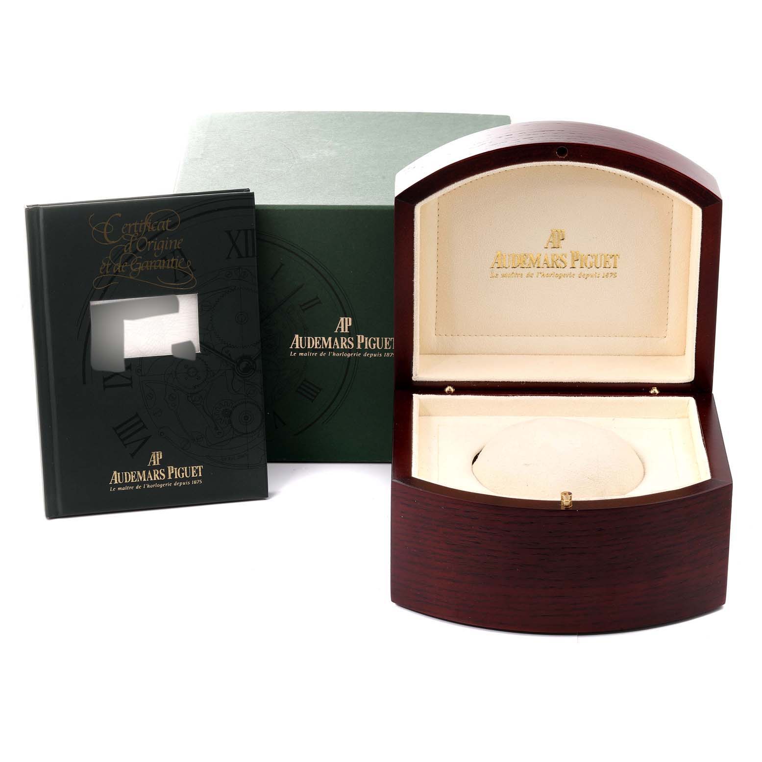 The image shows a Royal Oak watch box and a certificate booklet by Audemars Piguet, viewed from the front.