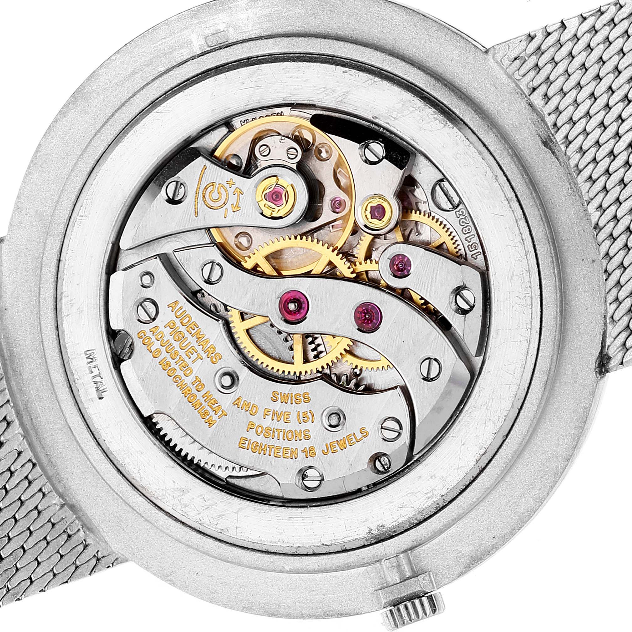 This image shows the intricate movement mechanism of a Vintage Audemars Piguet watch, viewed from the back.