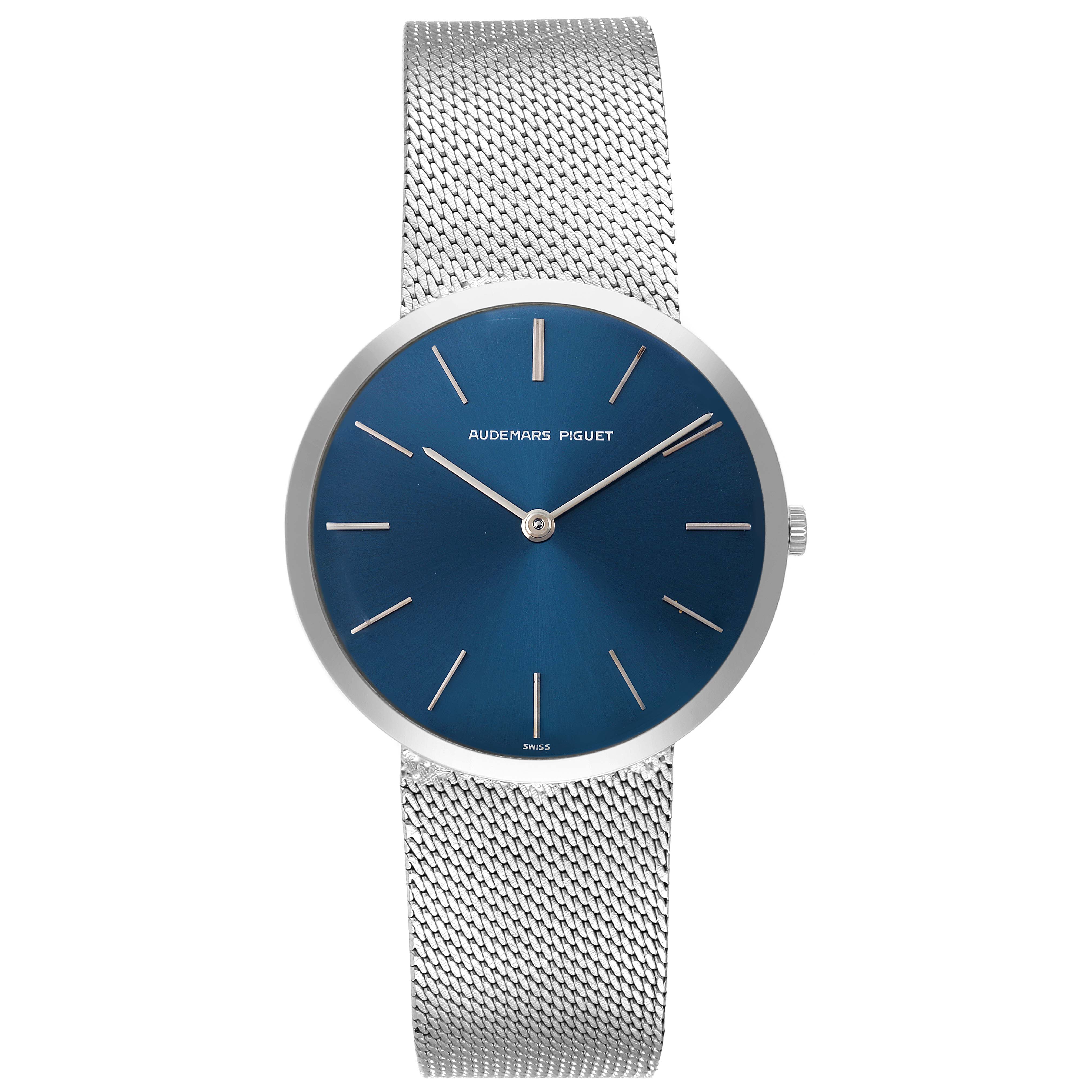 The image shows a front view of the Audemars Piguet Vintage Men's White Gold Blue Dial Men's White Gold Blue Dial watch, highlighting its blue dial, stainless steel case, and mesh bracelet.
