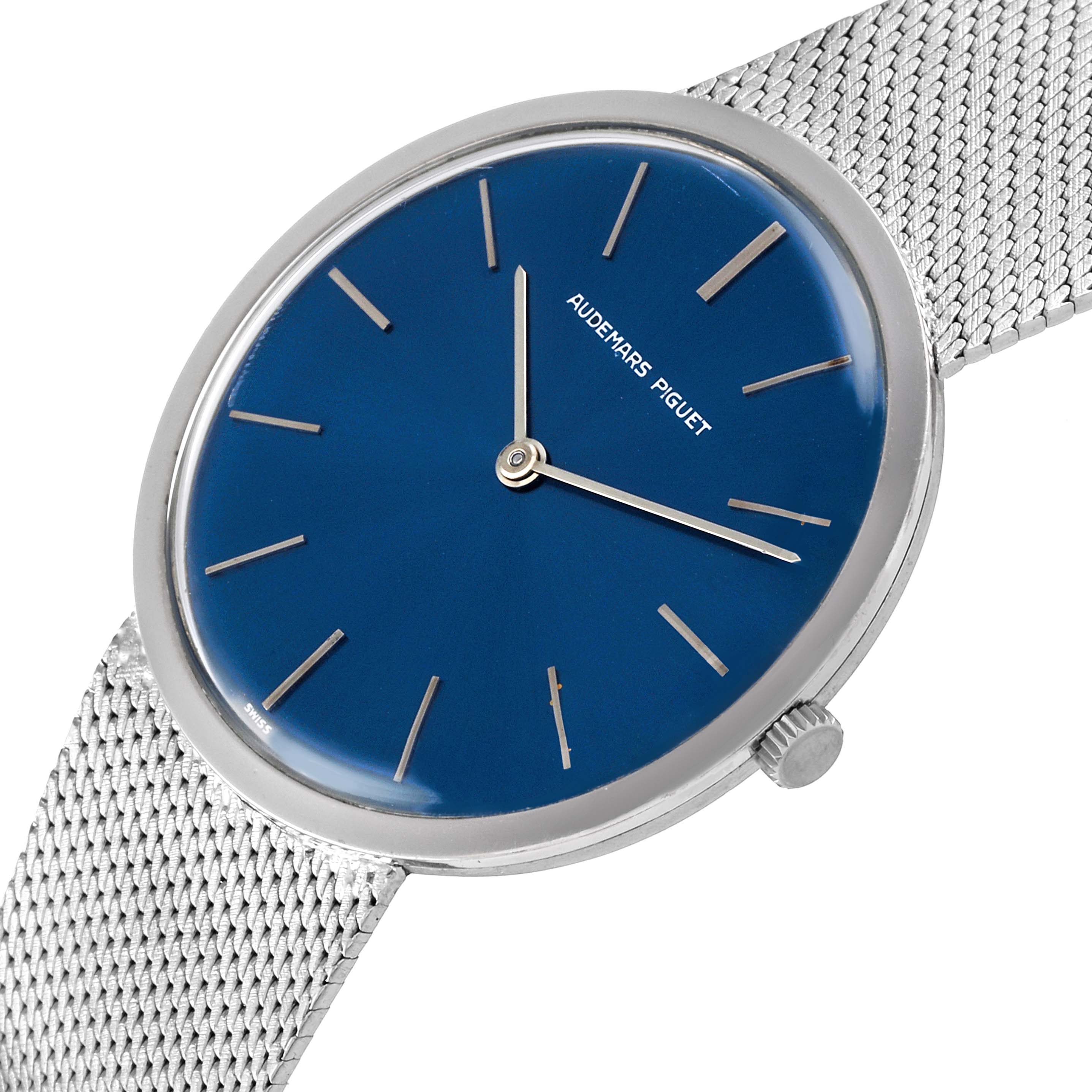 The image shows a close-up, angled view of the face and part of the metallic strap of a Vintage Audemars Piguet watch.