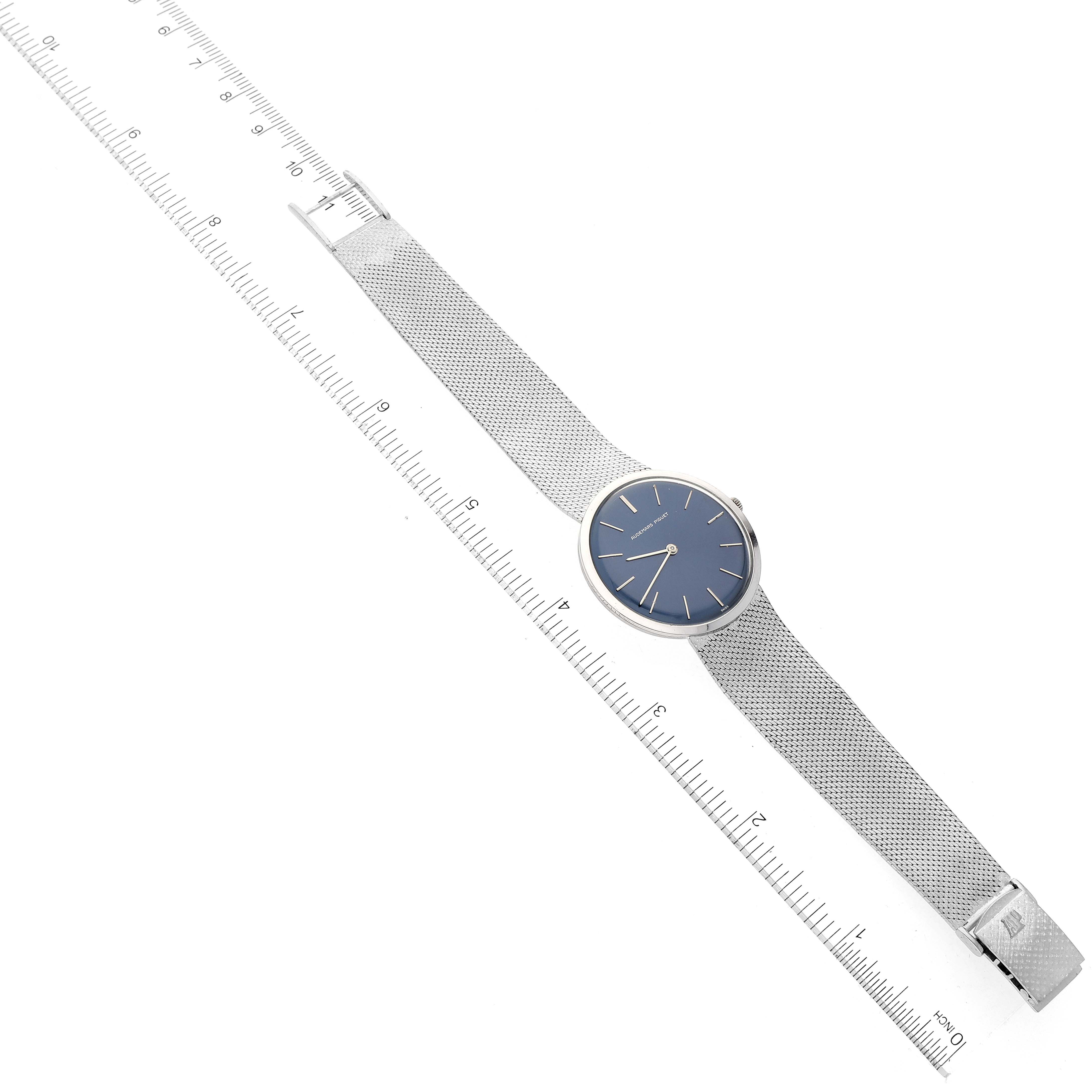 The image shows a Vintage Audemars Piguet watch laying flat with a ruler for scale, displaying the face, case, and mesh band.