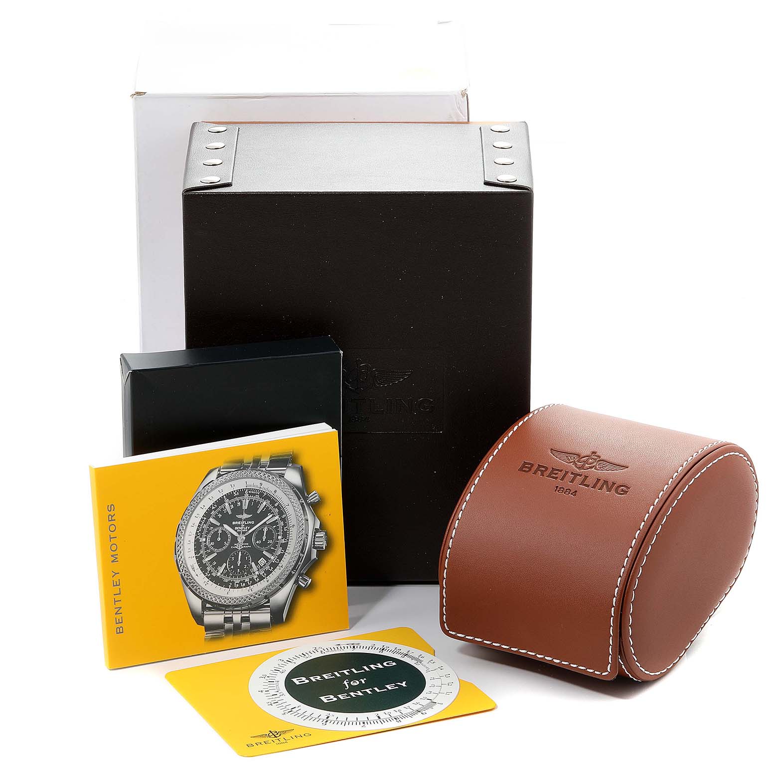 The image shows an assortment of accessories for the Breitling Bentley A25362 Men's Stainless Steel Black Dial A25362 Men's Stainless Steel Black Dial model, including a leather case, user manual, and packaging box.