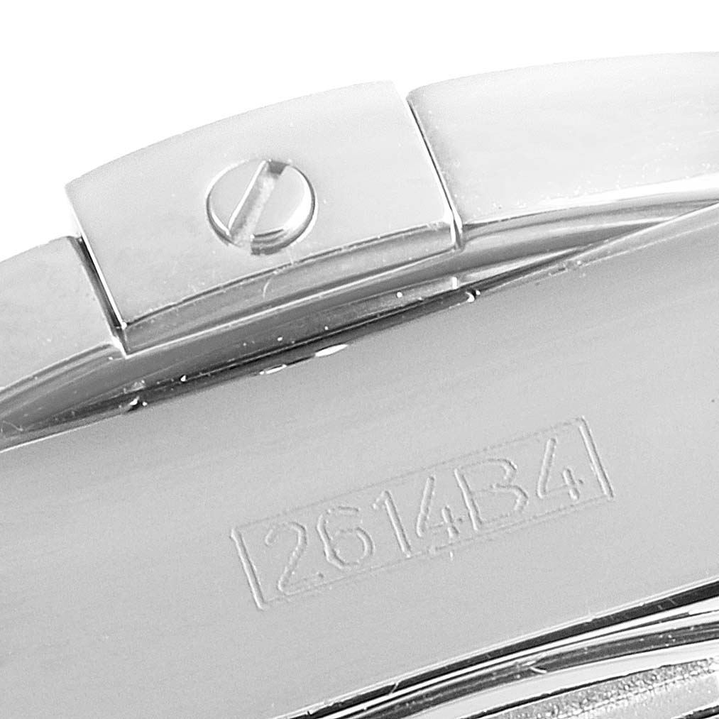 Close-up of a clasp and part of the bracelet of the Breitling Chronomat AB0141 Men's Stainless Steel Black Dial AB0141 Men's Stainless Steel Black Dial watch, showing a screw and the engraved model number.