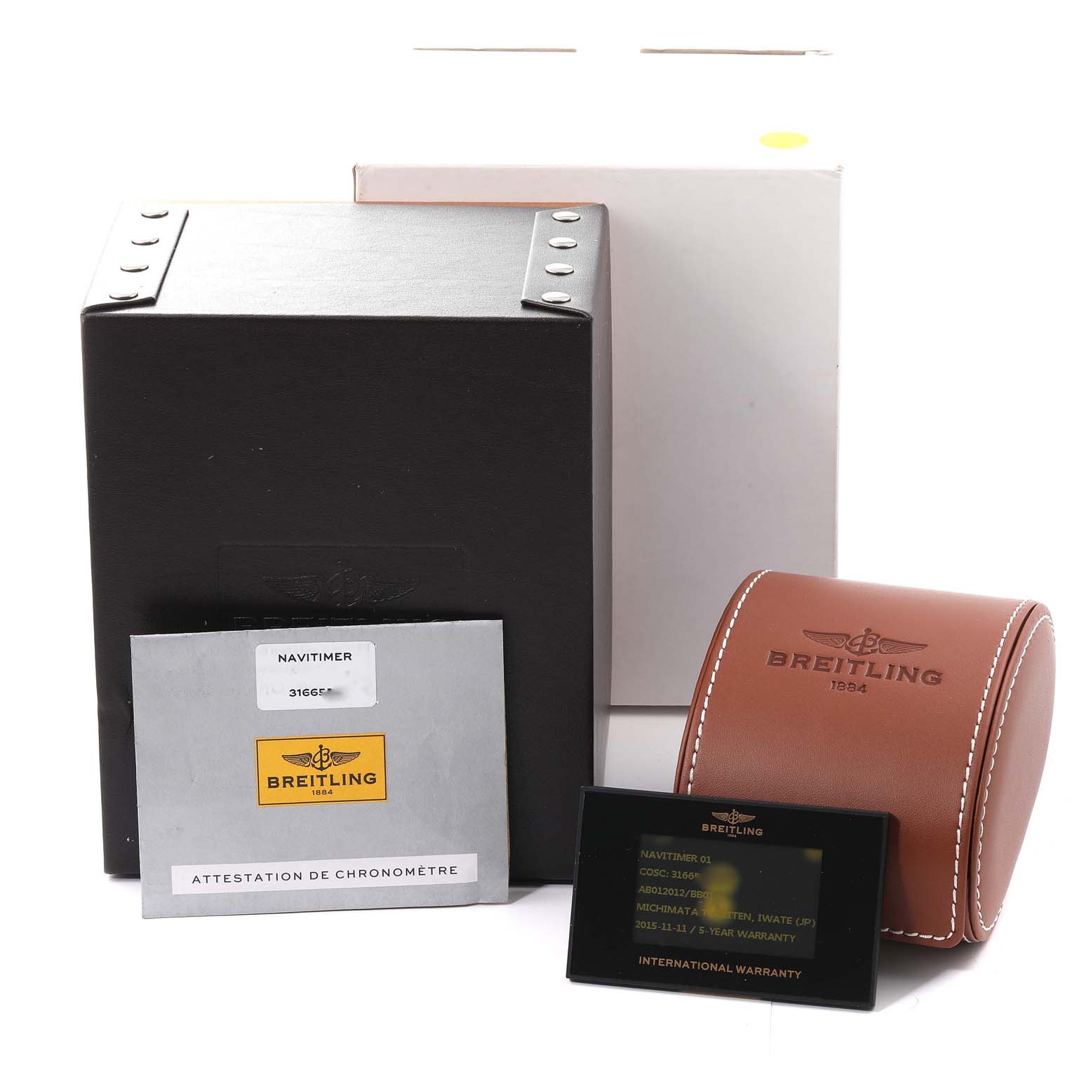 The image shows a Breitling Navitimer AB0120 Men's Stainless Steel Black Dial AB0120 Men's Stainless Steel Black Dial watch package at an angle, including a box, leather case, certification, and warranty card.