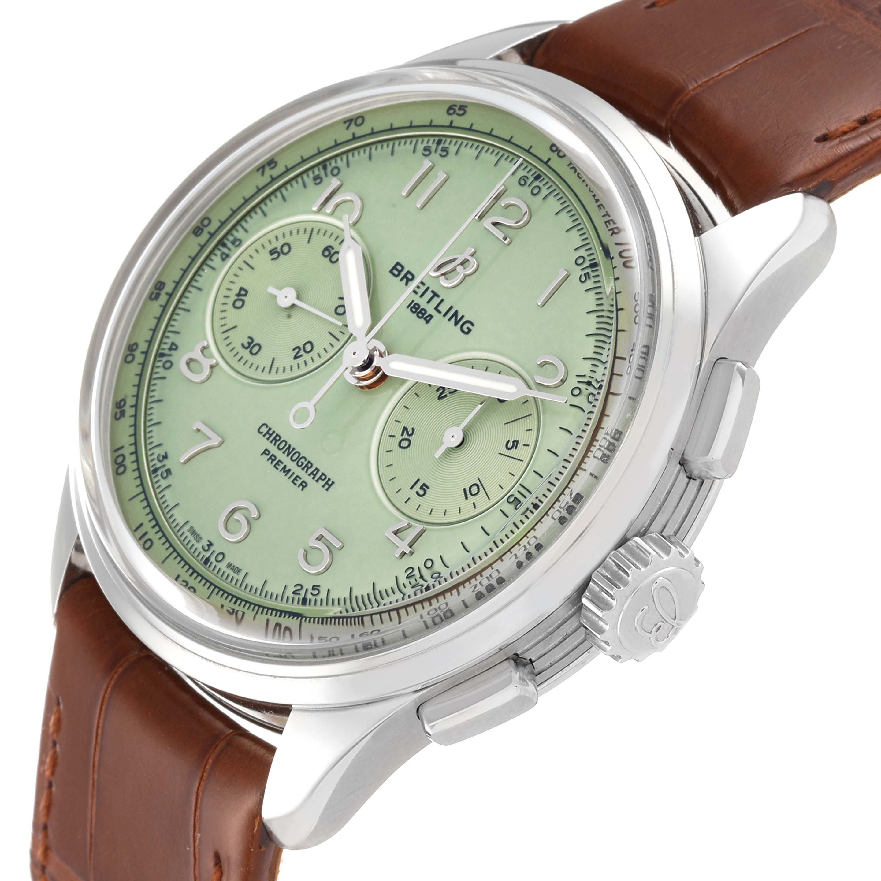 The image shows a side angle of a Breitling Premier AB0930 Men
s Stainless Steel Green Dial AB0930 Men
s Stainless Steel Green Dial model watch, displaying its face, crown, and brown leather strap.
