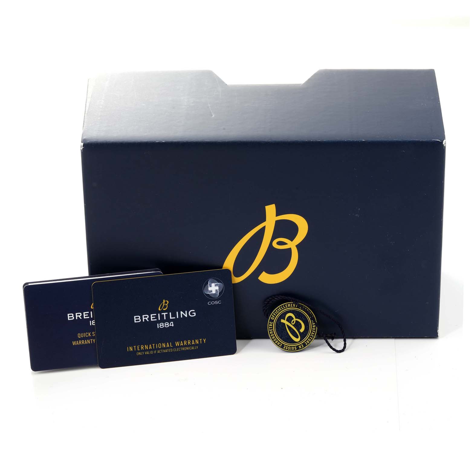 The image shows the packaging, international warranty card, and tag for a Breitling Premier AB0930 Men
s Stainless Steel Green Dial AB0930 Men
s Stainless Steel Green Dial model watch.