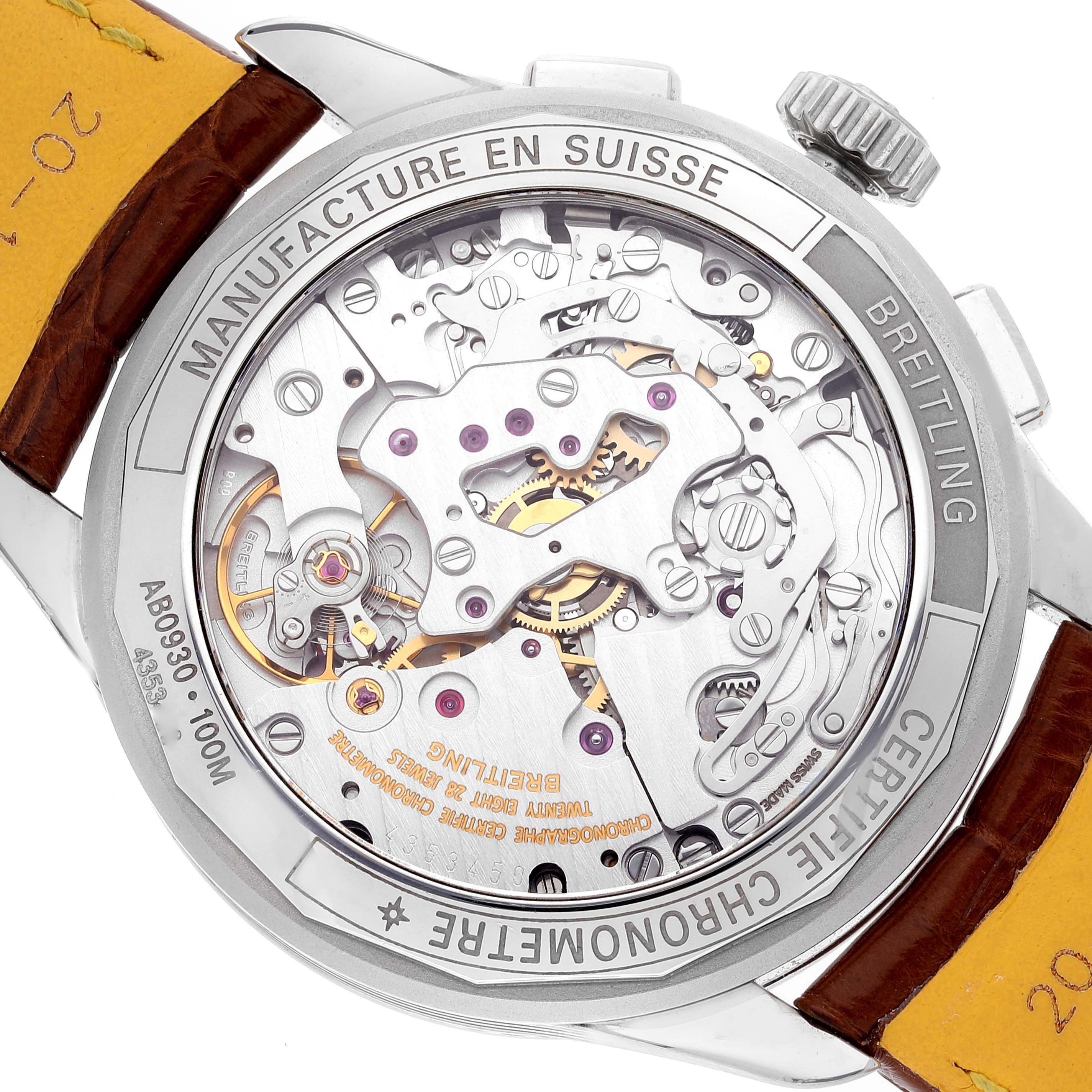 The image shows the back view of a Breitling Premier AB0930 Men
s Stainless Steel Green Dial AB0930 Men
s Stainless Steel Green Dial watch, highlighting its intricate movement and engravings.