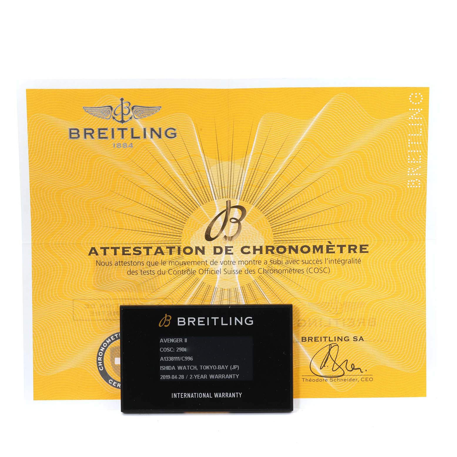 The image shows the warranty card and chronometer certificate for the Breitling Avenger A13381 Men's Stainless Steel Blue Dial A13381 Men's Stainless Steel Blue Dial II watch.