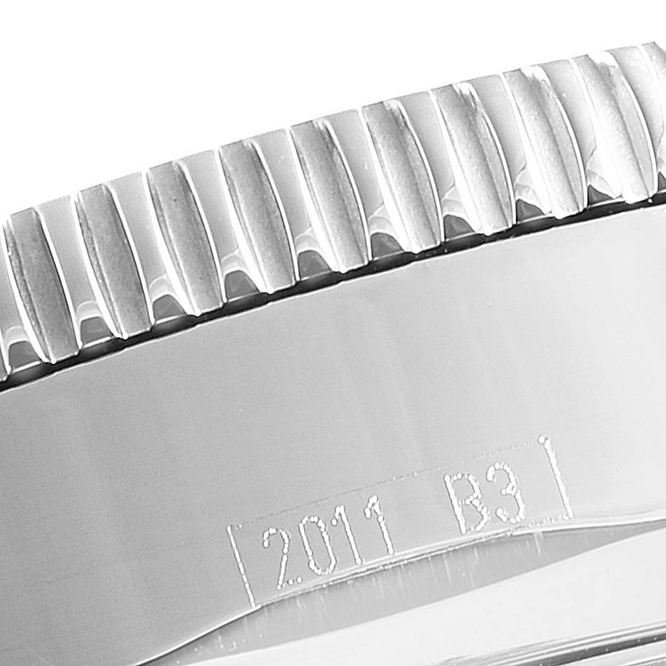 This image shows a close-up angle of the bezel and edge part of a Breitling Superocean A17320 Men
s Stainless Steel Black Dial A17320 Men
s Stainless Steel Black Dial watch, featuring ridged detailing and engraved markings.
