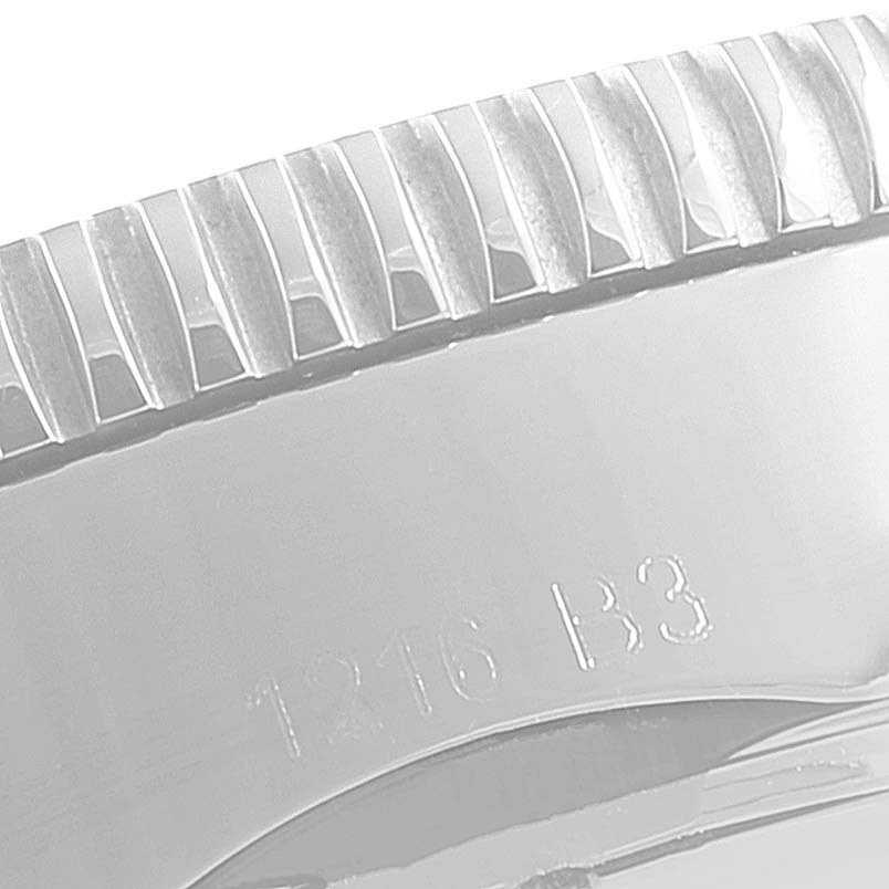 The image shows a close-up of the bezel and engraving on the side of a Breitling Superocean A13320 Men's Stainless Steel Blue Dial A13320 Men's Stainless Steel Blue Dial watch.