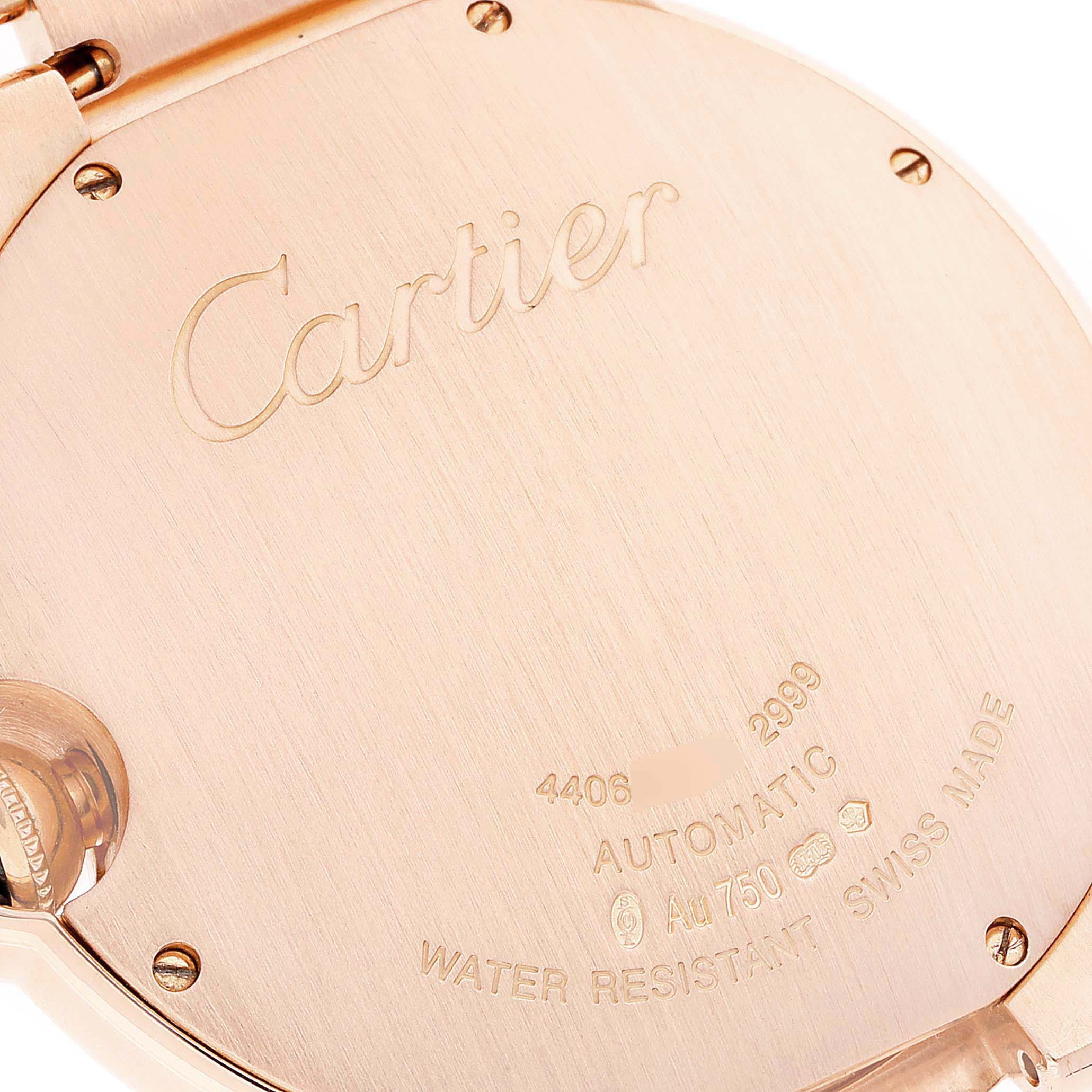 This image shows the back of a Cartier Ballon Bleu WGBB0016 Men's Rose Gold Silver Dial WGBB0016 Men's Rose Gold Silver Dial watch, displaying engravings and part of the bracelet.