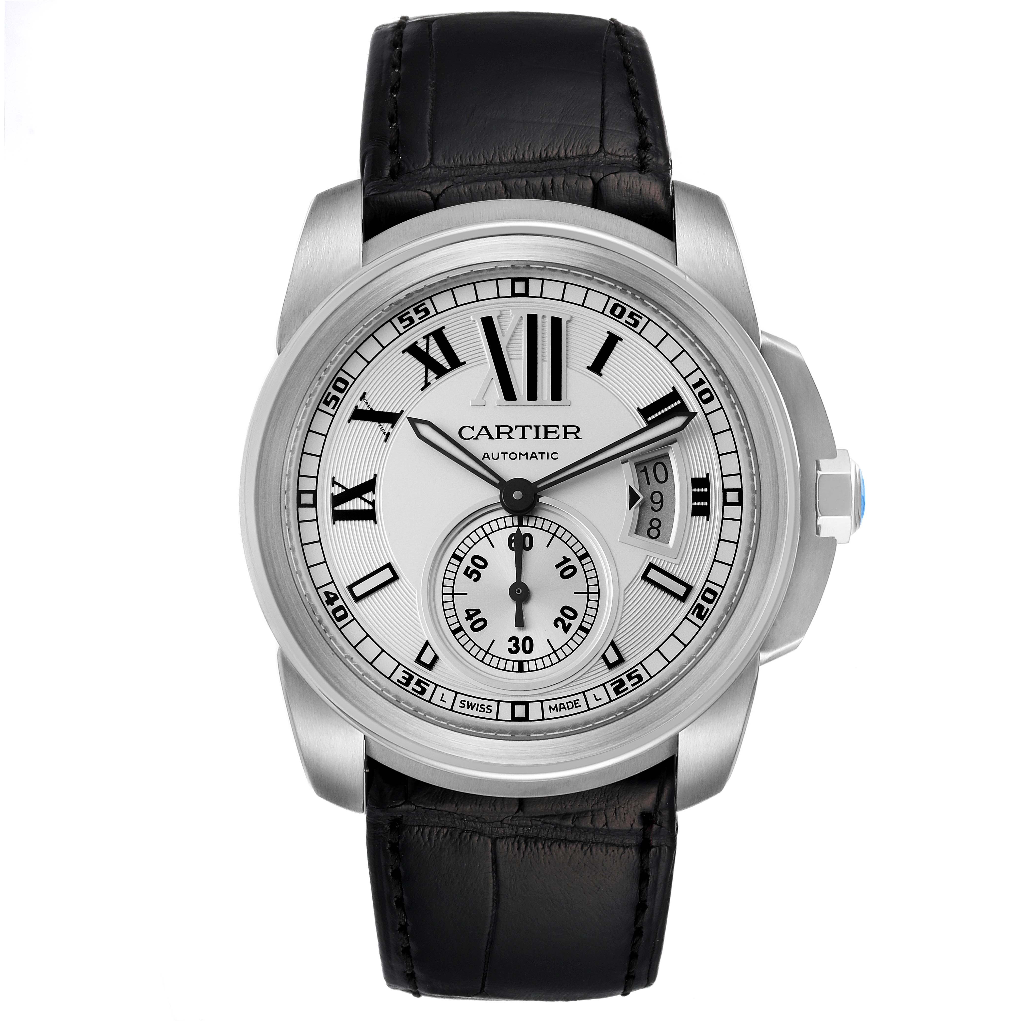 The image shows a frontal view of the Calibre de Cartier watch by Cartier, highlighting the dial, hands, and leather strap.