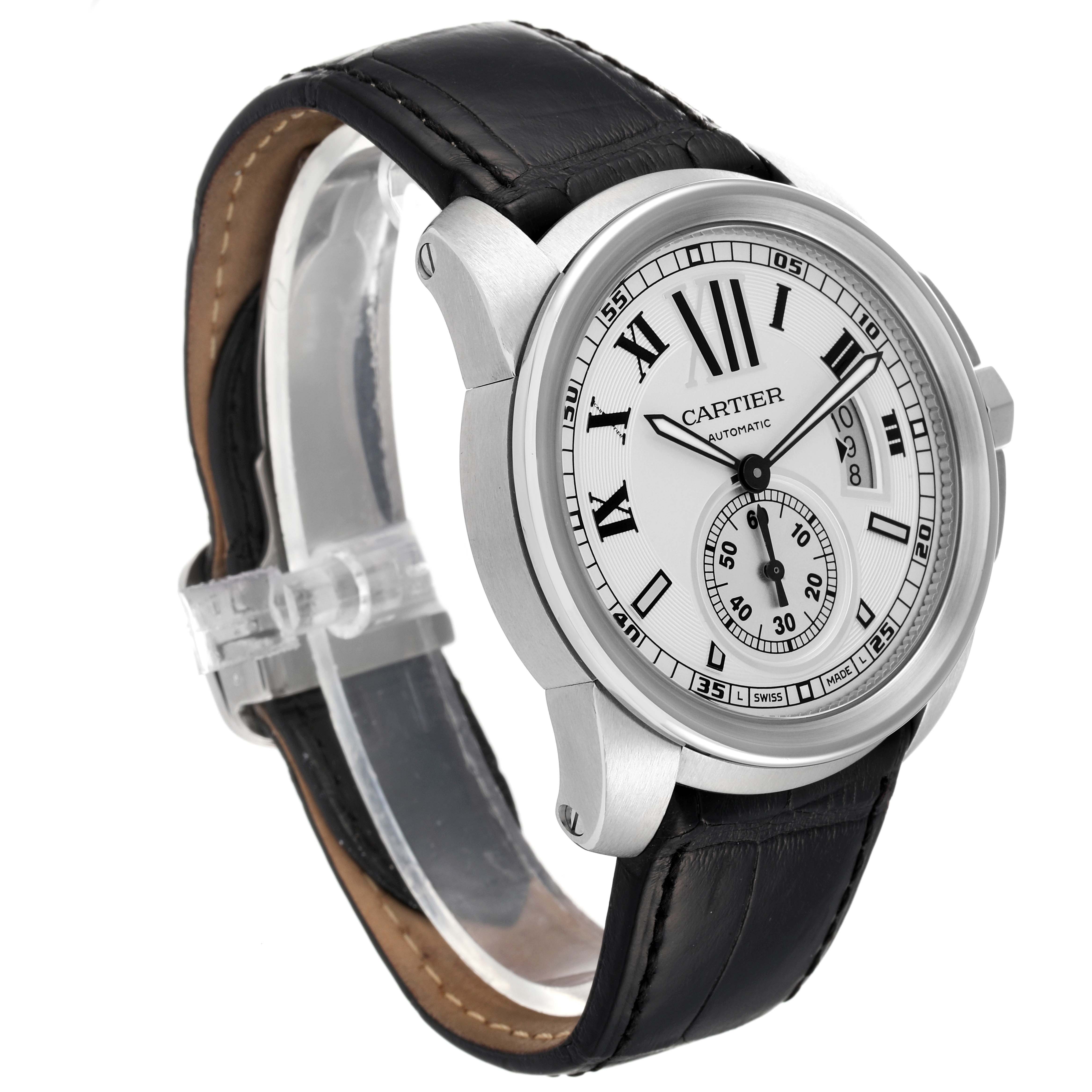 The image shows a Calibre de Cartier watch by Cartier at a three-quarter angle, highlighting the face, case, and strap.