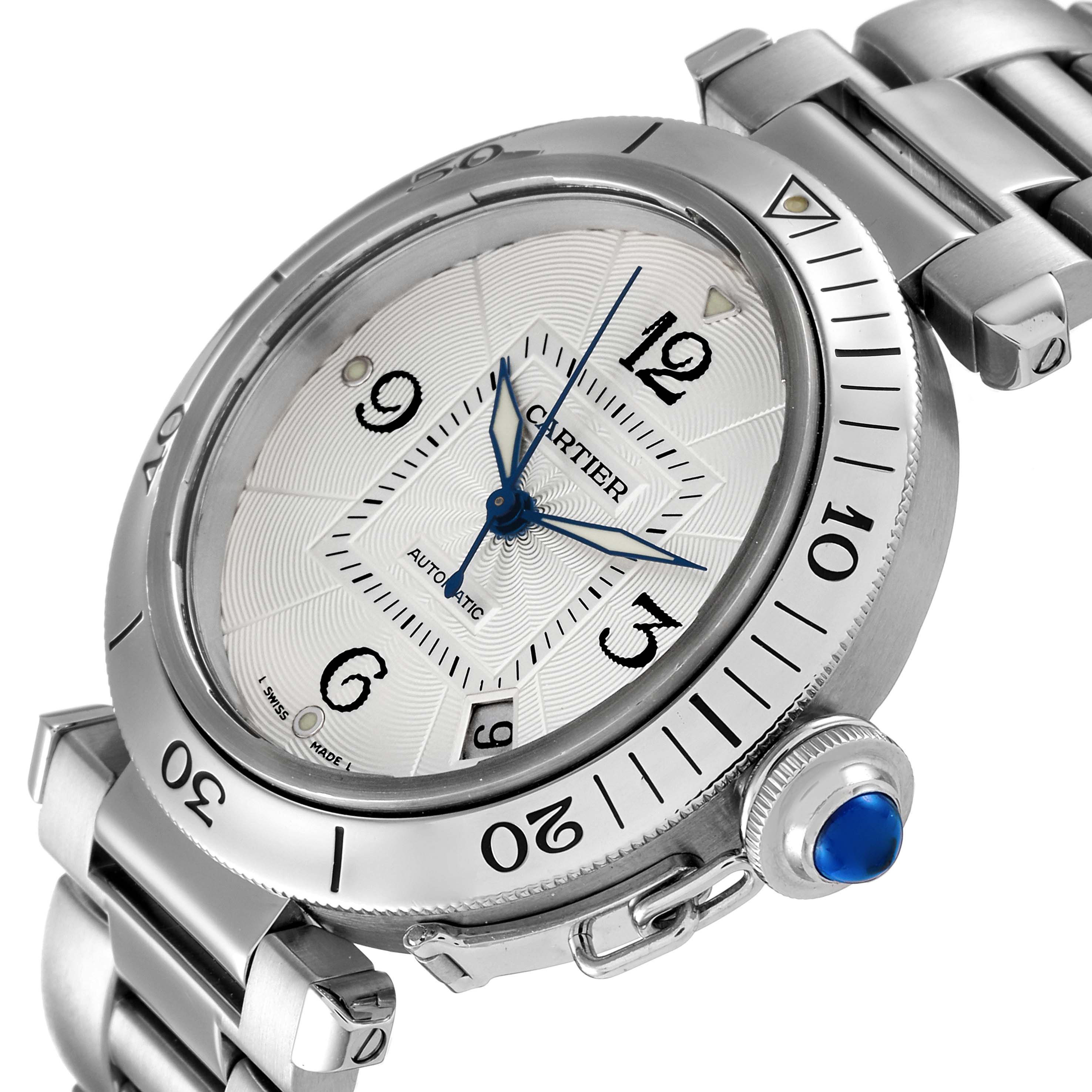 The image shows a close-up of the Cartier Pasha W31040H3 Men's Stainless Steel Silver Dial W31040H3 Men's Stainless Steel Silver Dial watch, highlighting the face, bezel, crown, and part of the stainless steel bracelet.