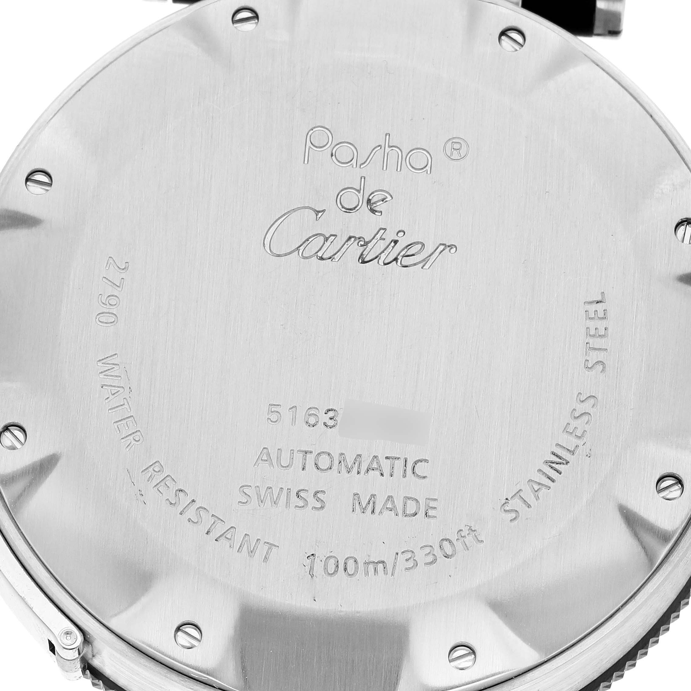 The image shows the back case of a Cartier Pasha W31077U2 Men
s Stainless Steel Black Dial W31077U2 Men
s Stainless Steel Black Dial watch, highlighting text details and screws.
