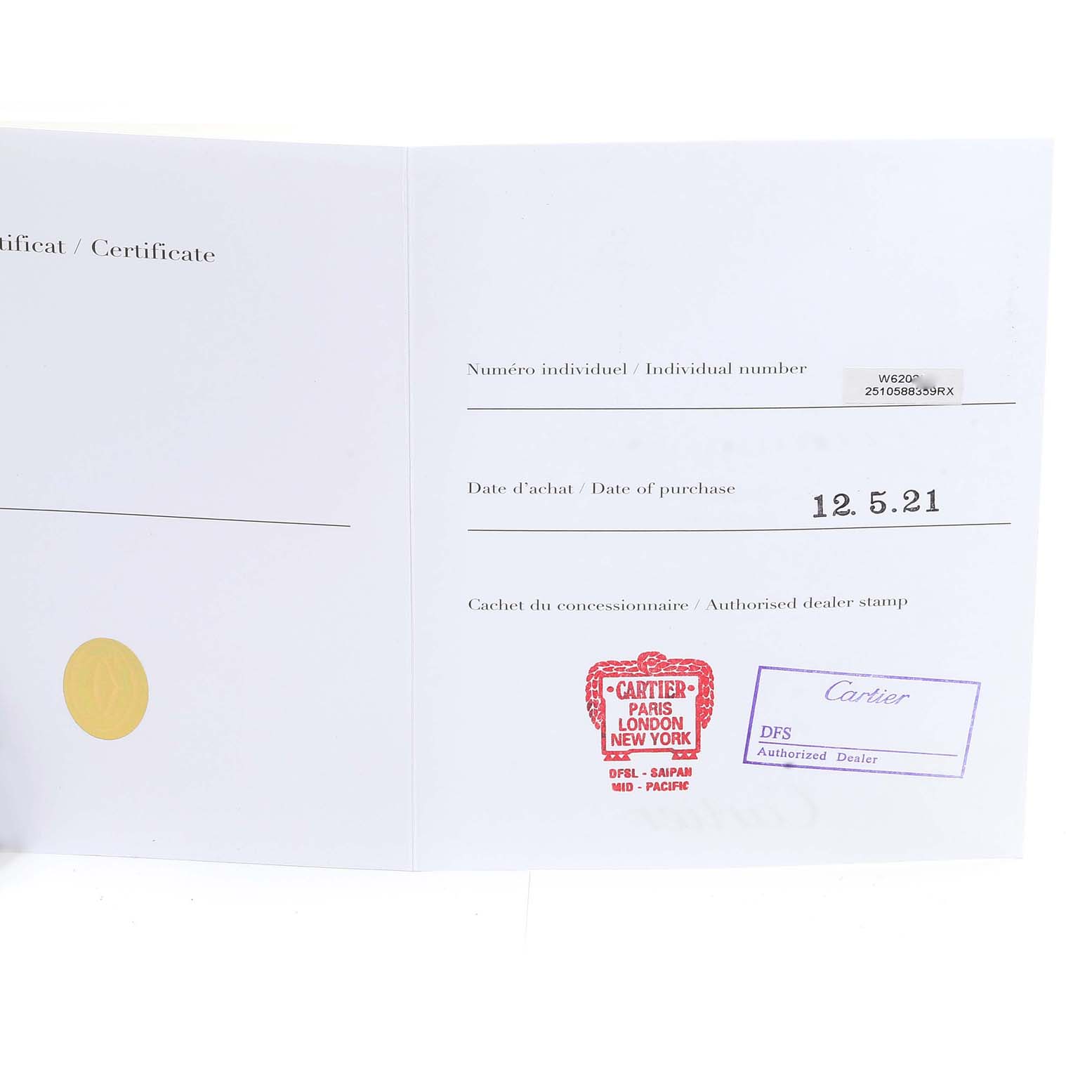 This image shows the certificate with purchase details and authorized dealer stamps for the Cartier Roadster W62025V3 Men
s Stainless Steel Silver Dial W62025V3 Men
s Stainless Steel Silver Dial watch.