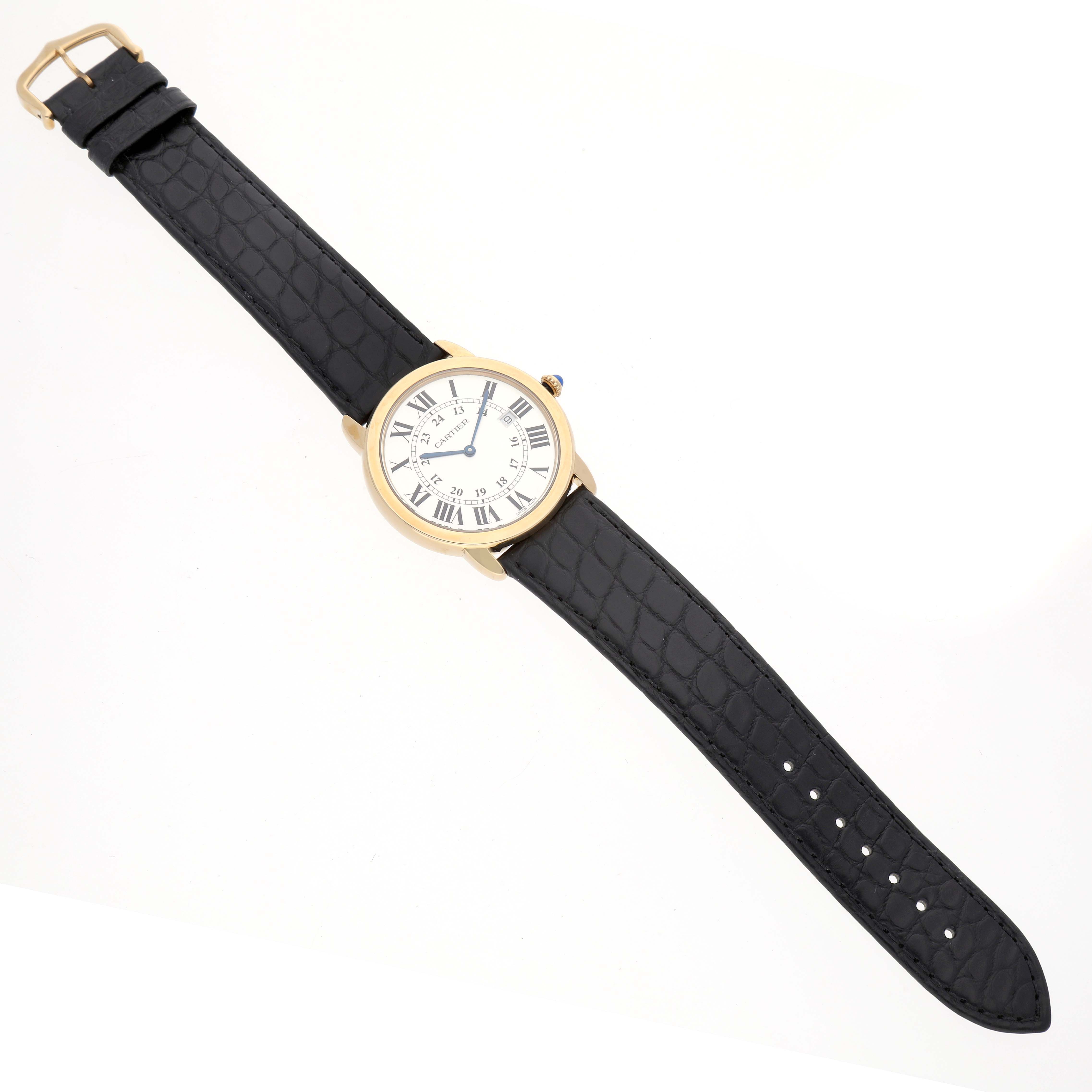 The image shows a Cartier Ronde W6700455 Men's Yellow Gold Silver Dial W6700455 Men's Yellow Gold Silver Dial watch with a black leather strap, viewed from a top-down angle.