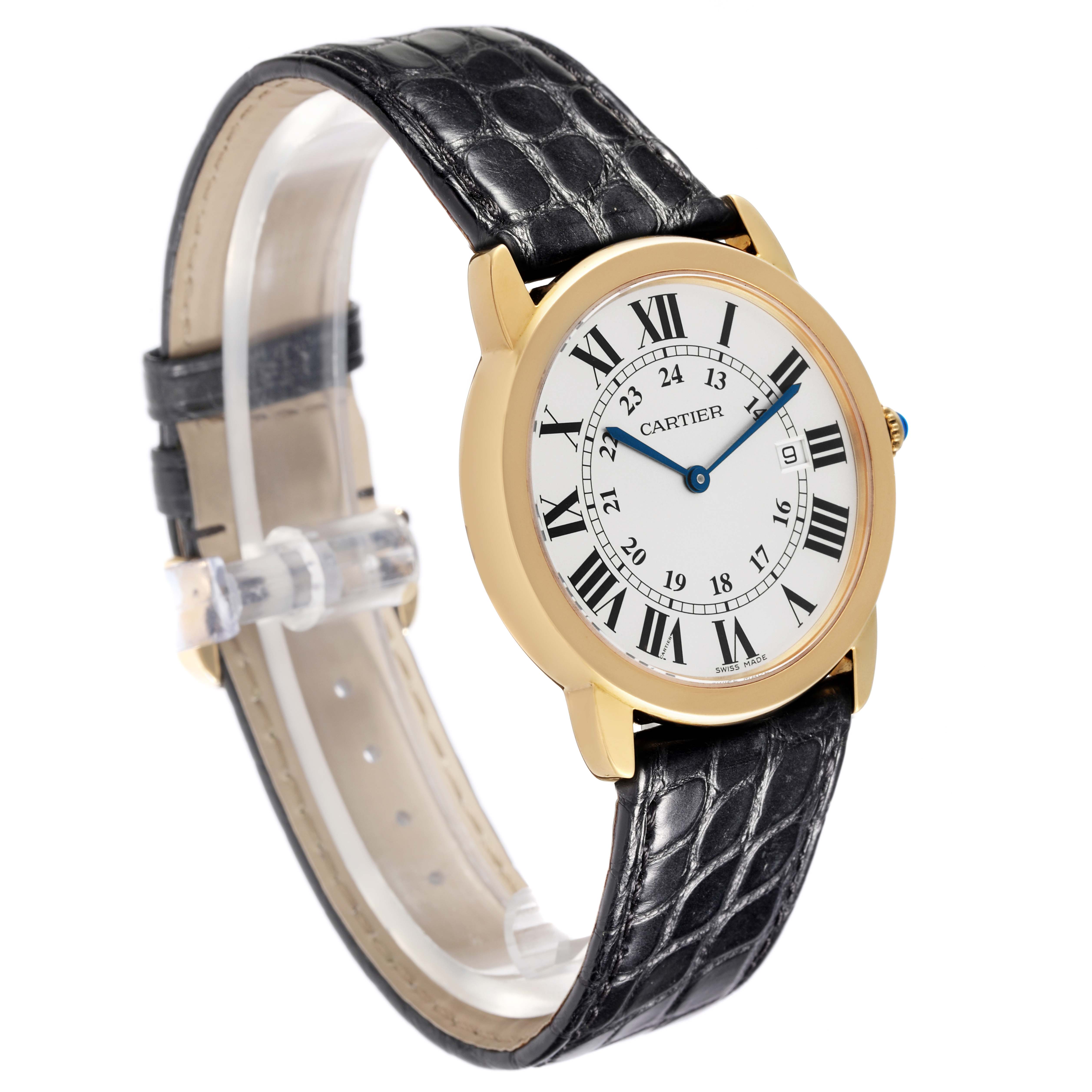 The Cartier Ronde W6700455 Men's Yellow Gold Silver Dial W6700455 Men's Yellow Gold Silver Dial model watch is shown at a slight angle, displaying its face with Roman numerals and its black leather strap.