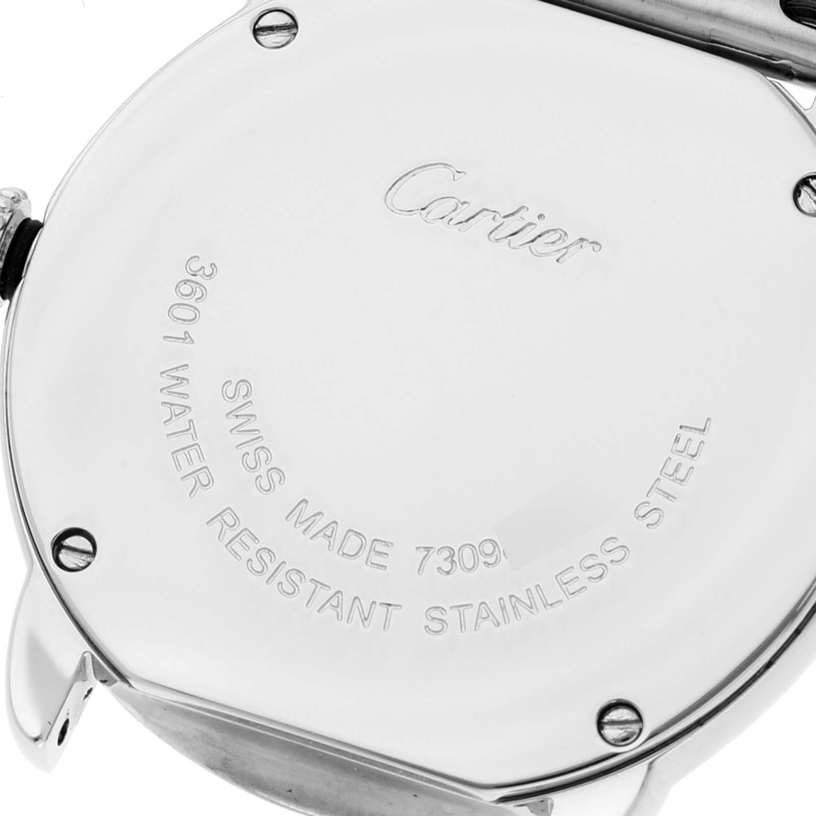 The image shows the back case of the Ronde model Cartier watch, highlighting its inscriptions and stainless steel material.