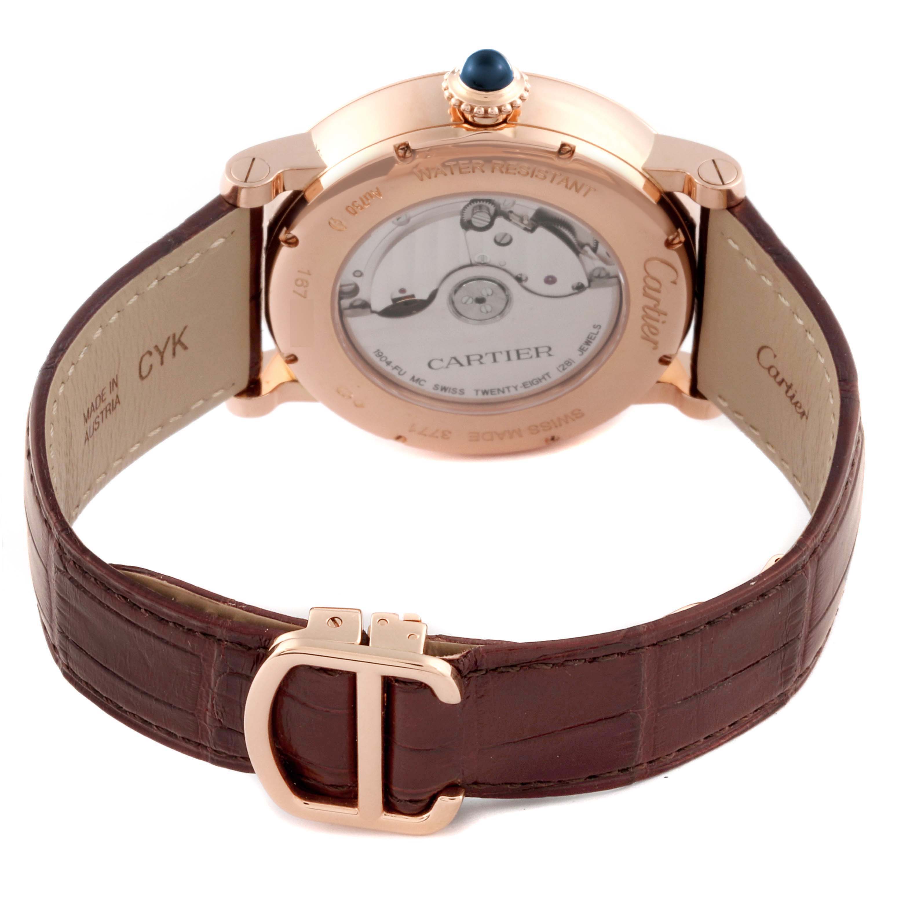 The image shows the back and strap of a Cartier Rotonde W1556240 Men
s Rose Gold Silver Dial W1556240 Men
s Rose Gold Silver Dial watch, highlighting the leather band and transparent case back.