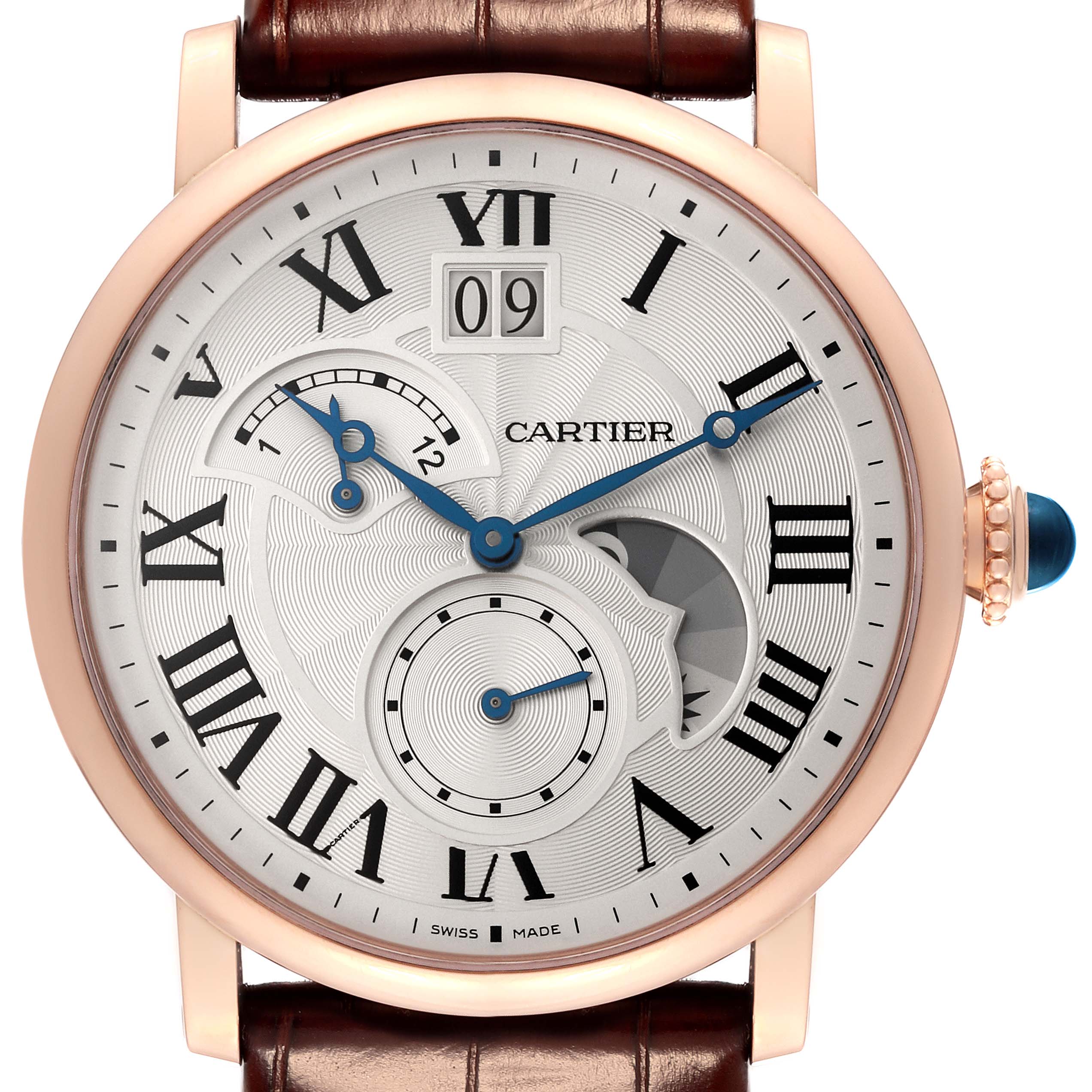 The image displays a front view of the Rotonde model by Cartier, featuring blue hands, Roman numerals, and a leather strap.