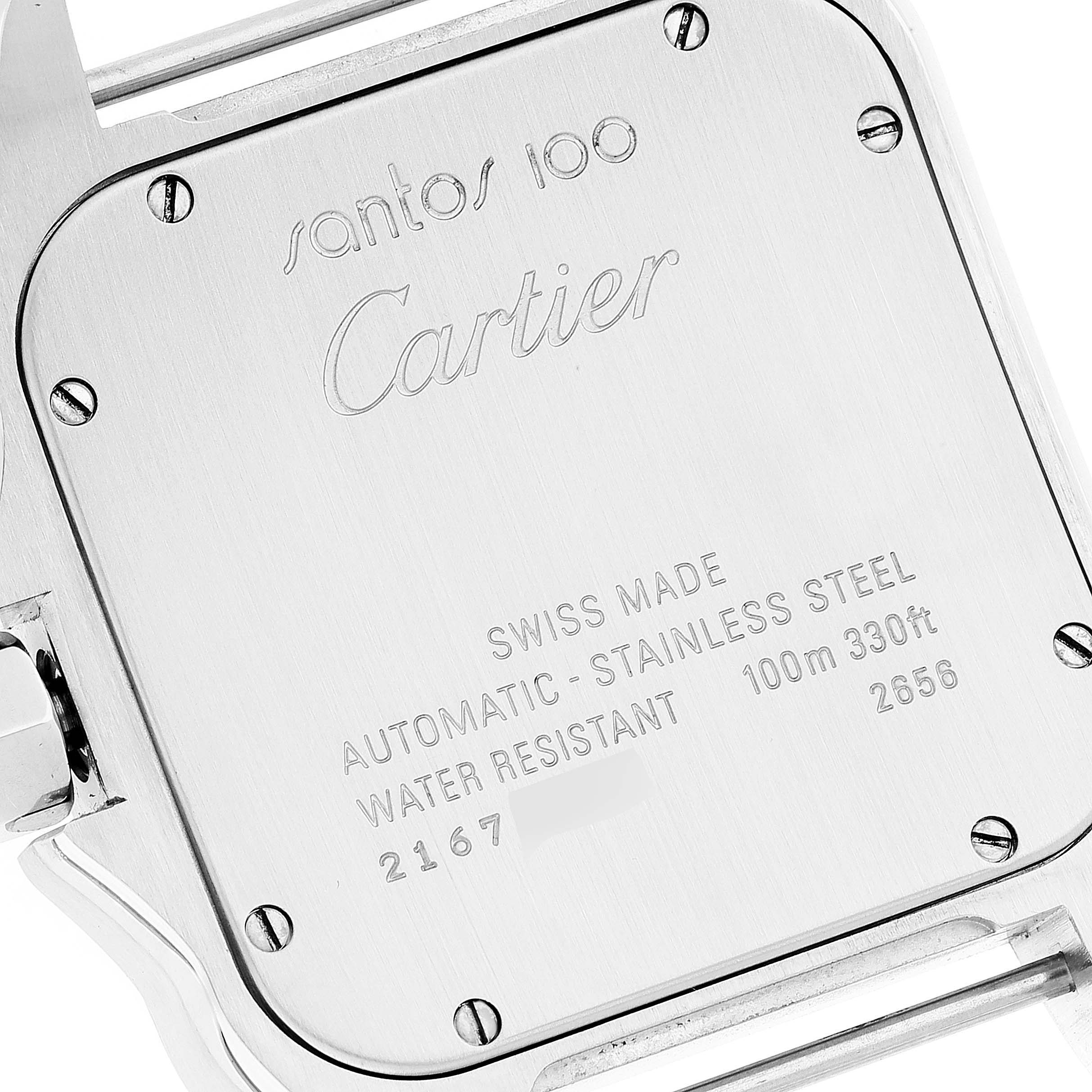 The image shows the back case of a Santos 100 model by Cartier, displaying text and specifications.