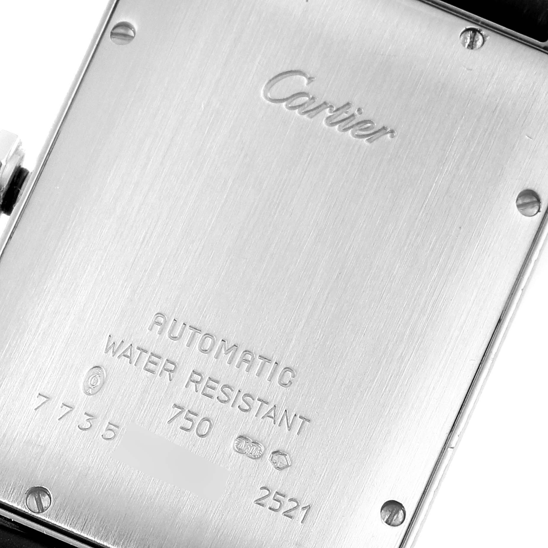 The image shows the back case of the Cartier Tank Americaine W2603256 Men's White Gold Silver Dial W2603256 Men's White Gold Silver Dial watch, highlighting engravings and markings.