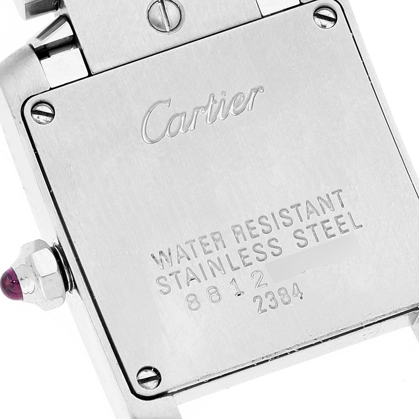 The image shows the back of a Cartier Tank Française watch, including the brand engraving and water resistance information.