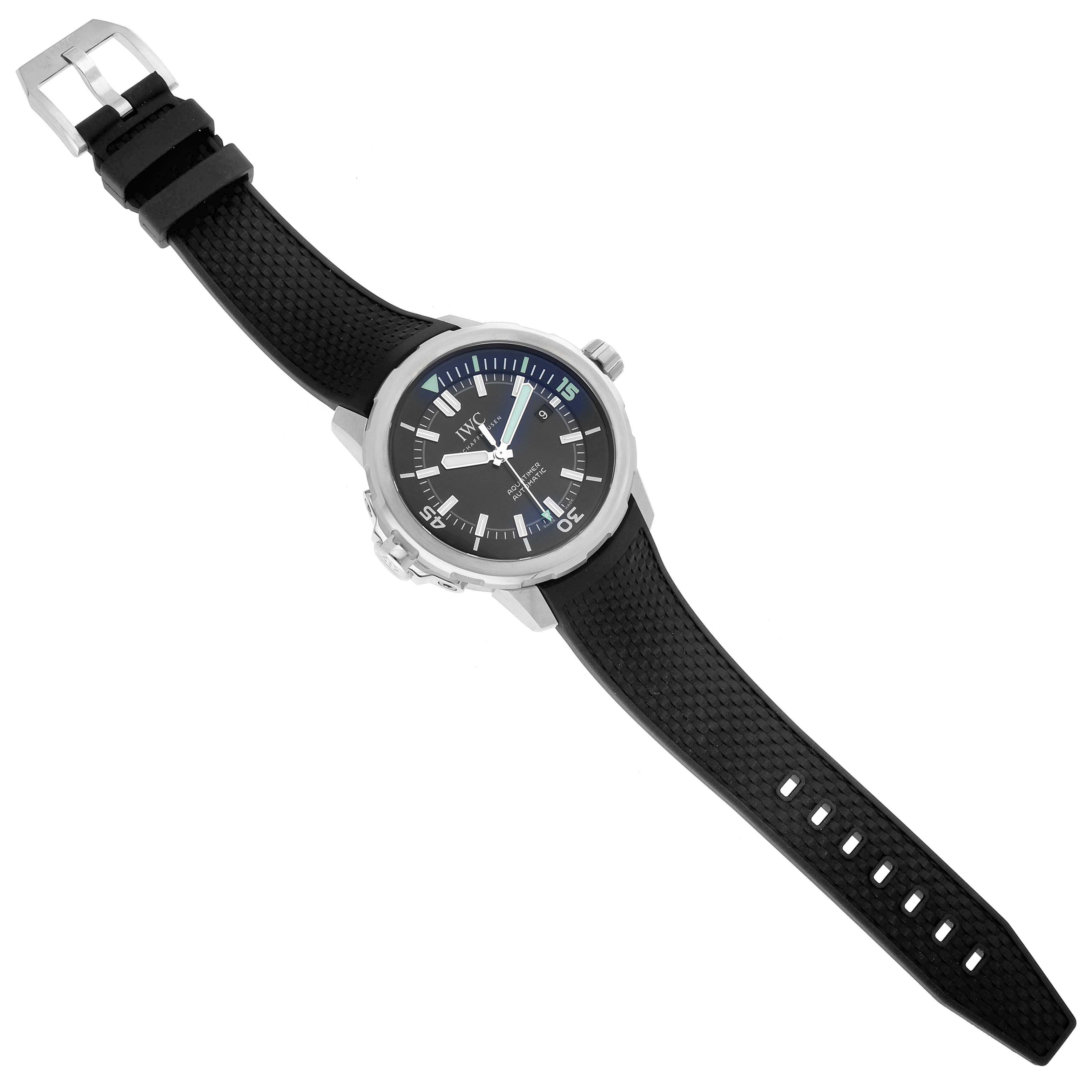 The image shows an IWC Aquatimer IW329001 Men's Stainless Steel Black Dial IW329001 Men's Stainless Steel Black Dial watch from a top-down angle, featuring its black strap, face, bezel, and buckle.