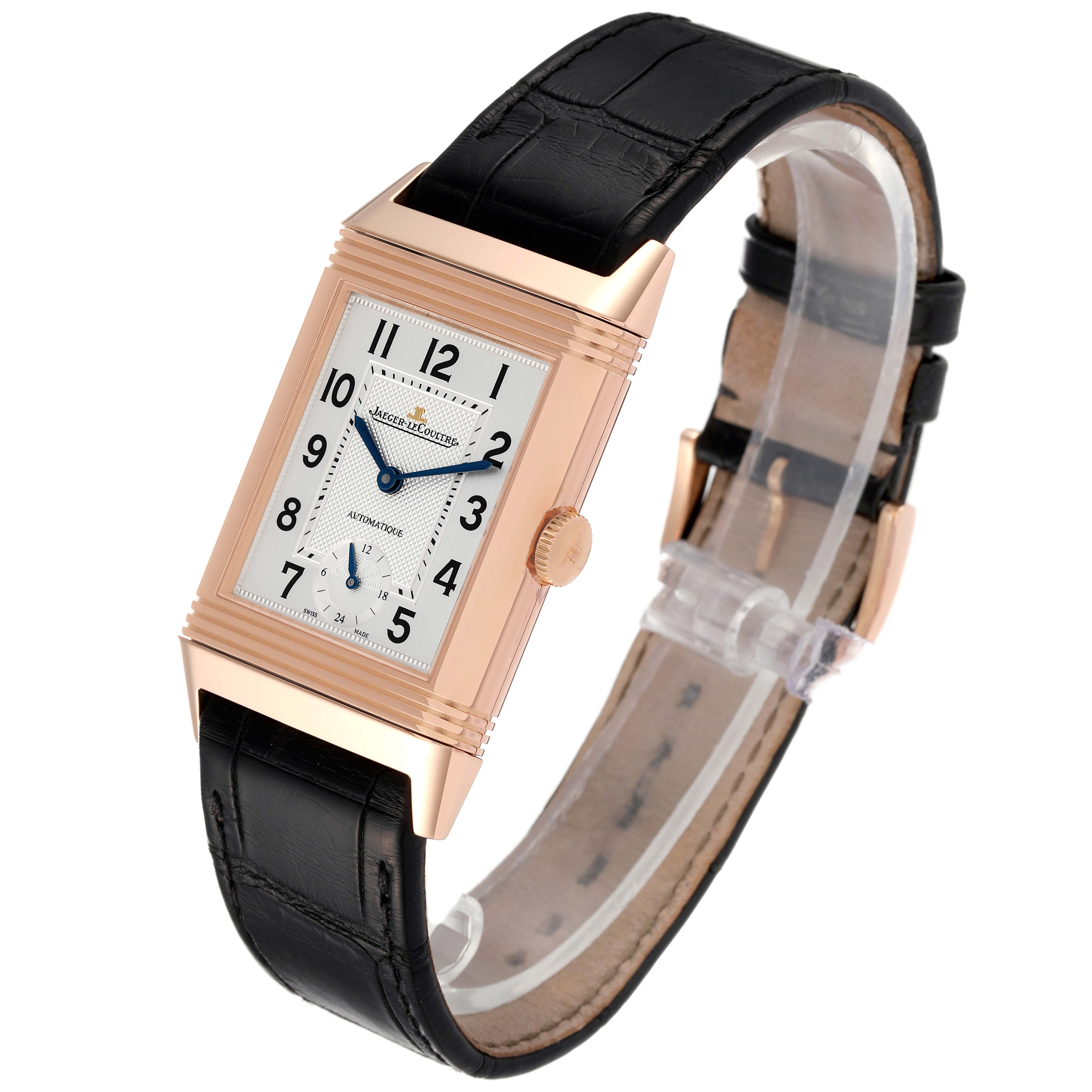 The image shows a Jaeger LeCoultre Reverso Q3802520 Men's Rose Gold Silver Dial Q3802520 Men's Rose Gold Silver Dial watch at a slight angle, highlighting the rectangular case, dial, crown, and leather strap.