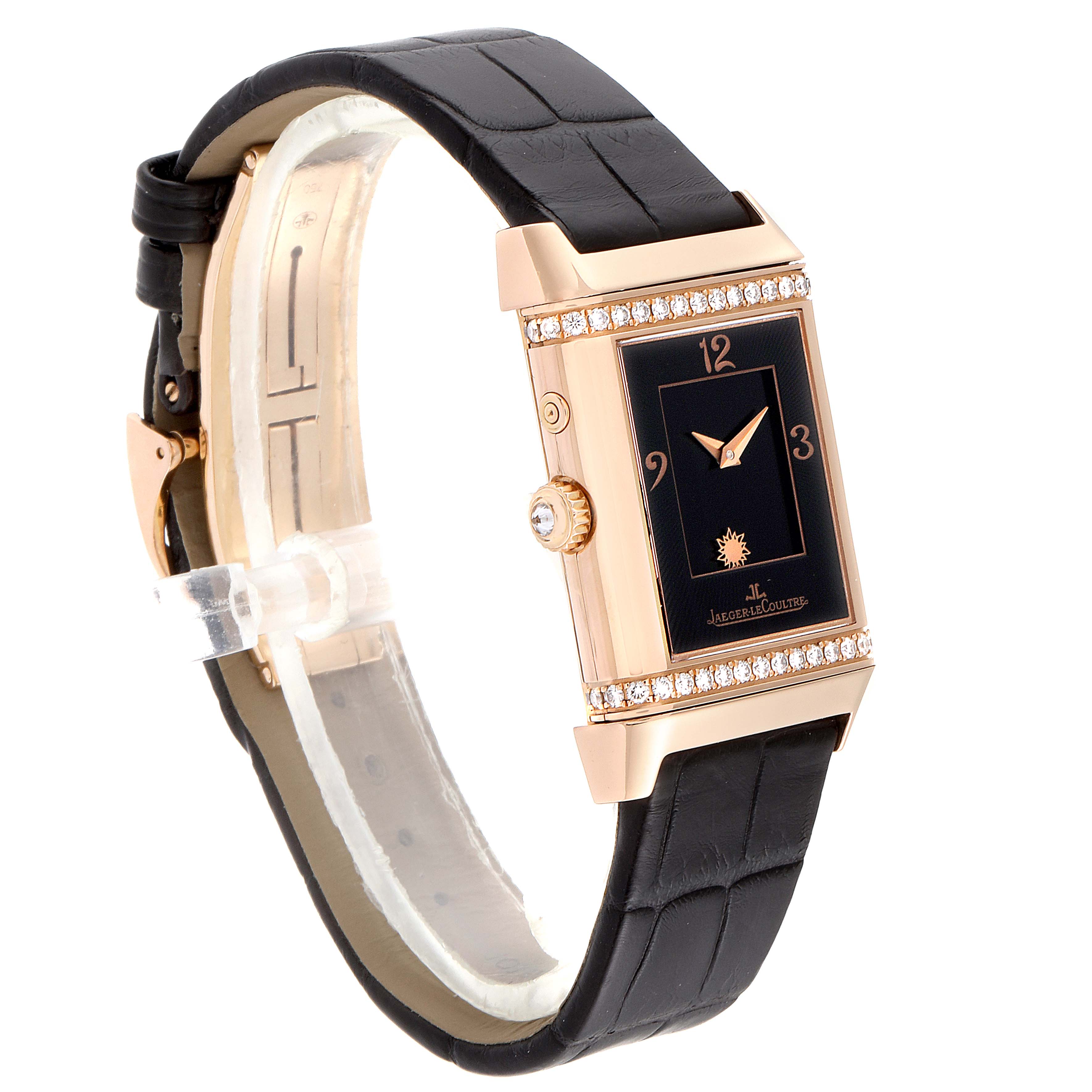 The Jaeger LeCoultre Reverso Q2692420 Women's Rose Gold Silver Dial Q2692420 Women's Rose Gold Silver Dial watch is shown at a slight angle, displaying its rectangular face, case, crown, and leather strap.