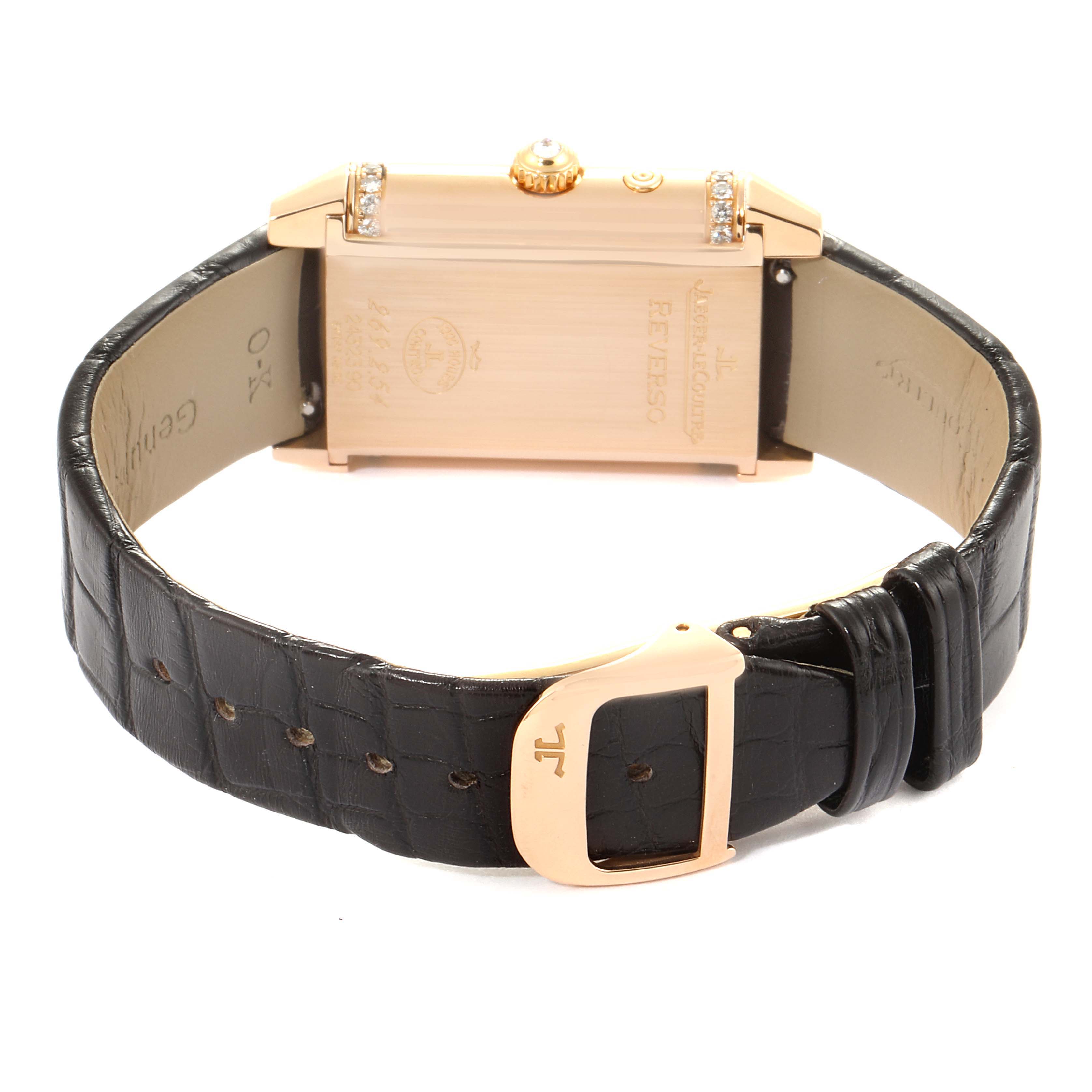 This image shows the backside of a Jaeger LeCoultre Reverso Q2692420 Women's Rose Gold Silver Dial Q2692420 Women's Rose Gold Silver Dial watch, highlighting the strap, clasp, and engravings.