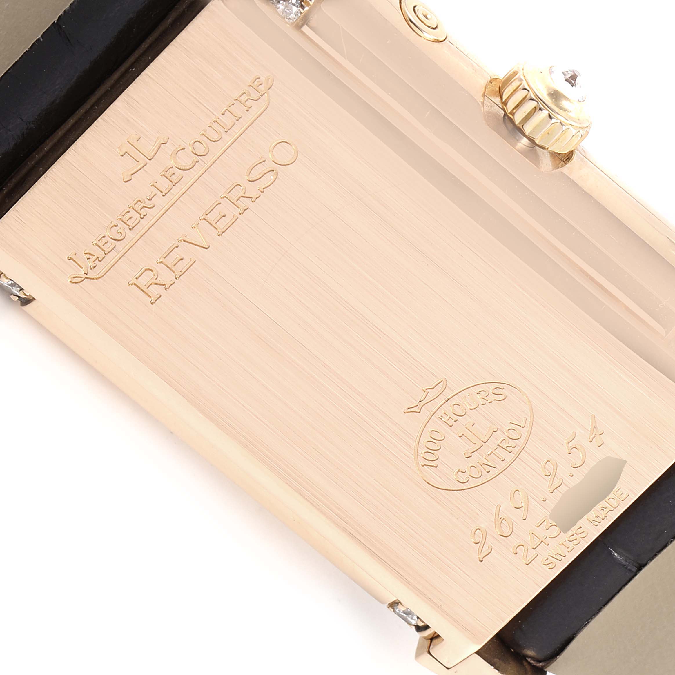 The image shows the case back of a Jaeger LeCoultre Reverso Q2692420 Women's Rose Gold Silver Dial Q2692420 Women's Rose Gold Silver Dial watch, including the crown and engraved inscriptions.