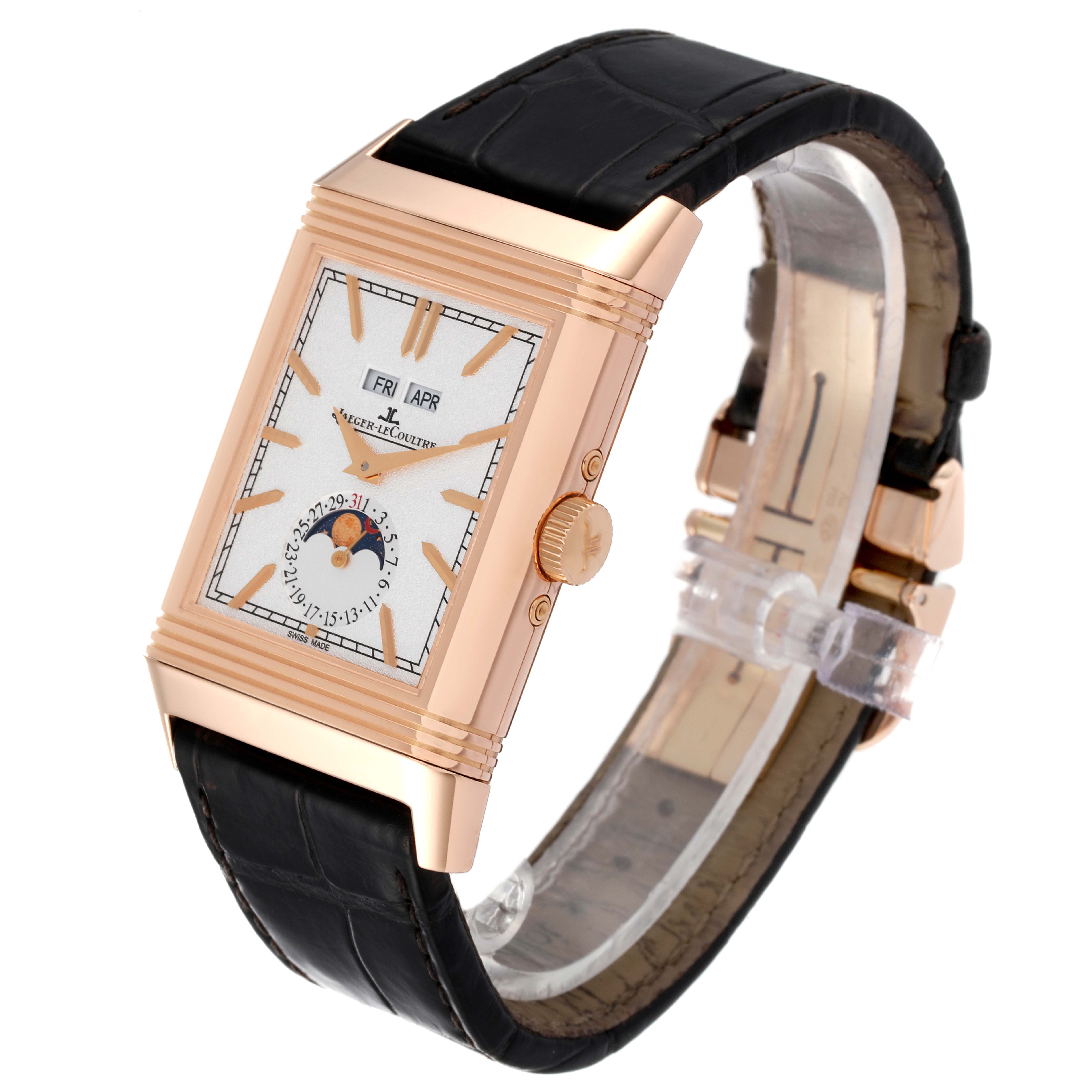 The Jaeger LeCoultre Reverso Q3912420 Men's Rose Gold Silver Dial Q3912420 Men's Rose Gold Silver Dial watch is shown at a three-quarter angle, highlighting its dial, crown, and black leather strap.