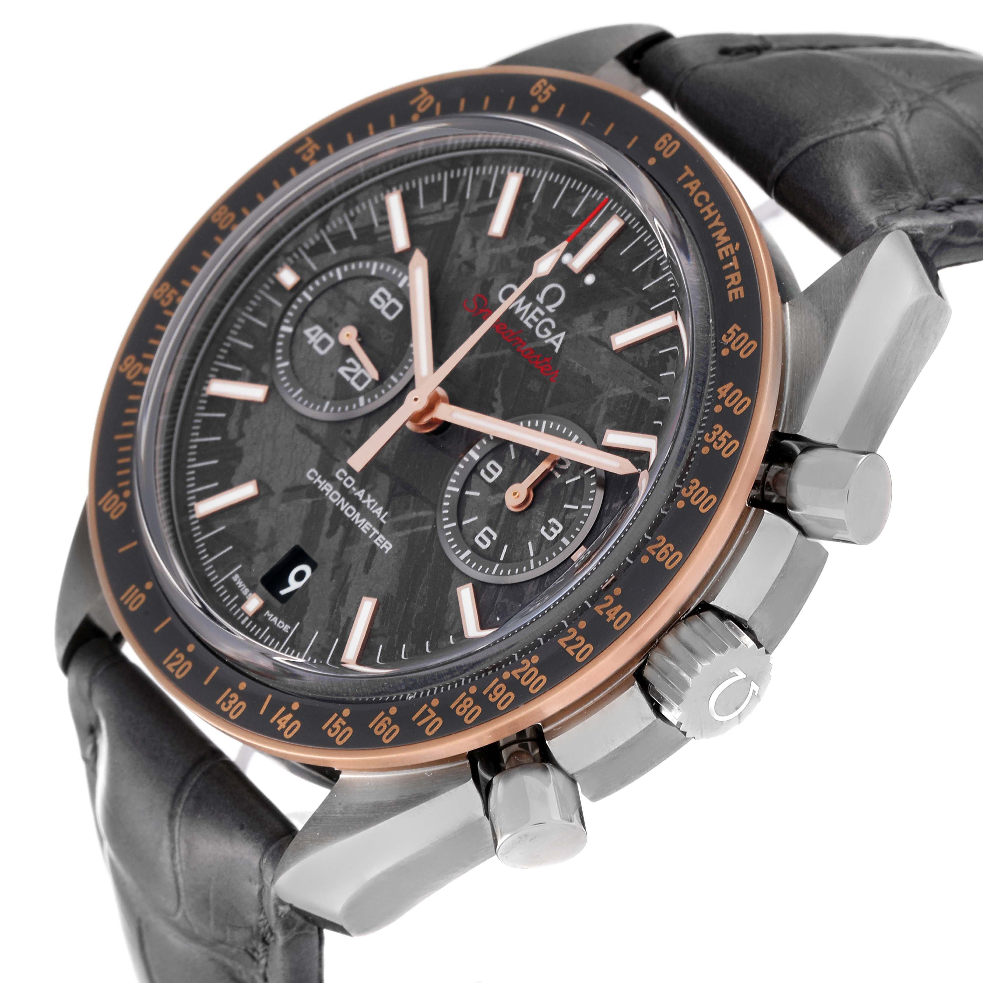 The image shows an angled close-up of the Omega Speedmaster 311.63.44.51.99.001 Men's Stainless Steel Grey Dial 311.63.44.51.99.001 Men's Stainless Steel Grey Dial watch, focusing on the face, crown, and pushers.