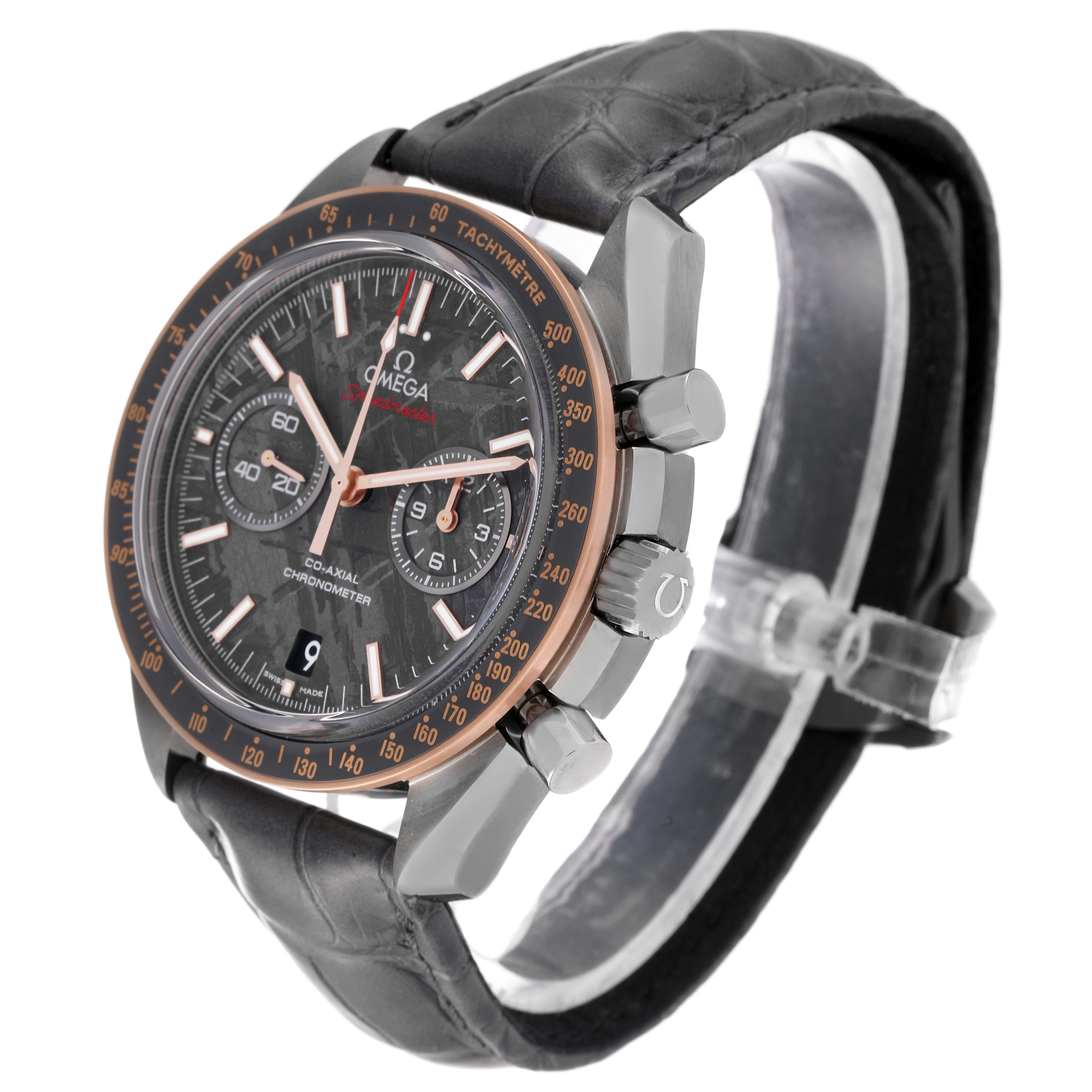 The image shows a side angle of an Omega Speedmaster 311.63.44.51.99.001 Men's Stainless Steel Grey Dial 311.63.44.51.99.001 Men's Stainless Steel Grey Dial watch highlighting the face, chronograph buttons, and strap.