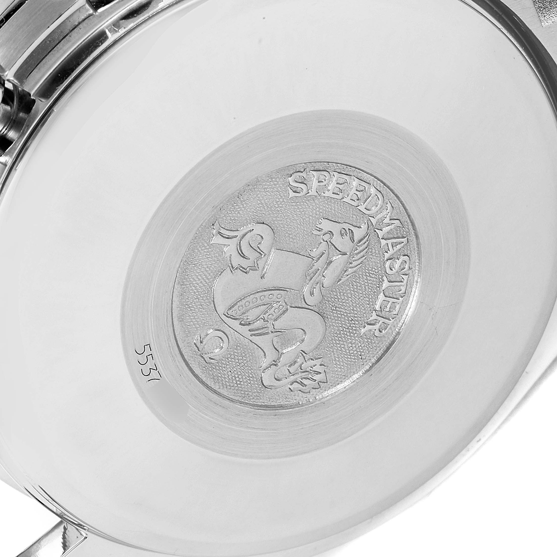 The image shows the back case of the Omega Speedmaster 3520.53.00 Men's Stainless Steel Grey Dial 3520.53.00 Men's Stainless Steel Grey Dial watch from a close-up angle, highlighting the engraved emblem and model name.