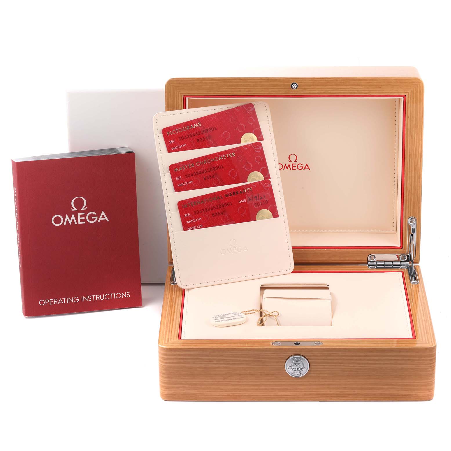 The image shows an Omega Speedmaster 304.33.44.52.03.001 Men's Stainless Steel Blue Dial 304.33.44.52.03.001 Men's Stainless Steel Blue Dial watch box, operating instructions manual, and certificates from a front angle.