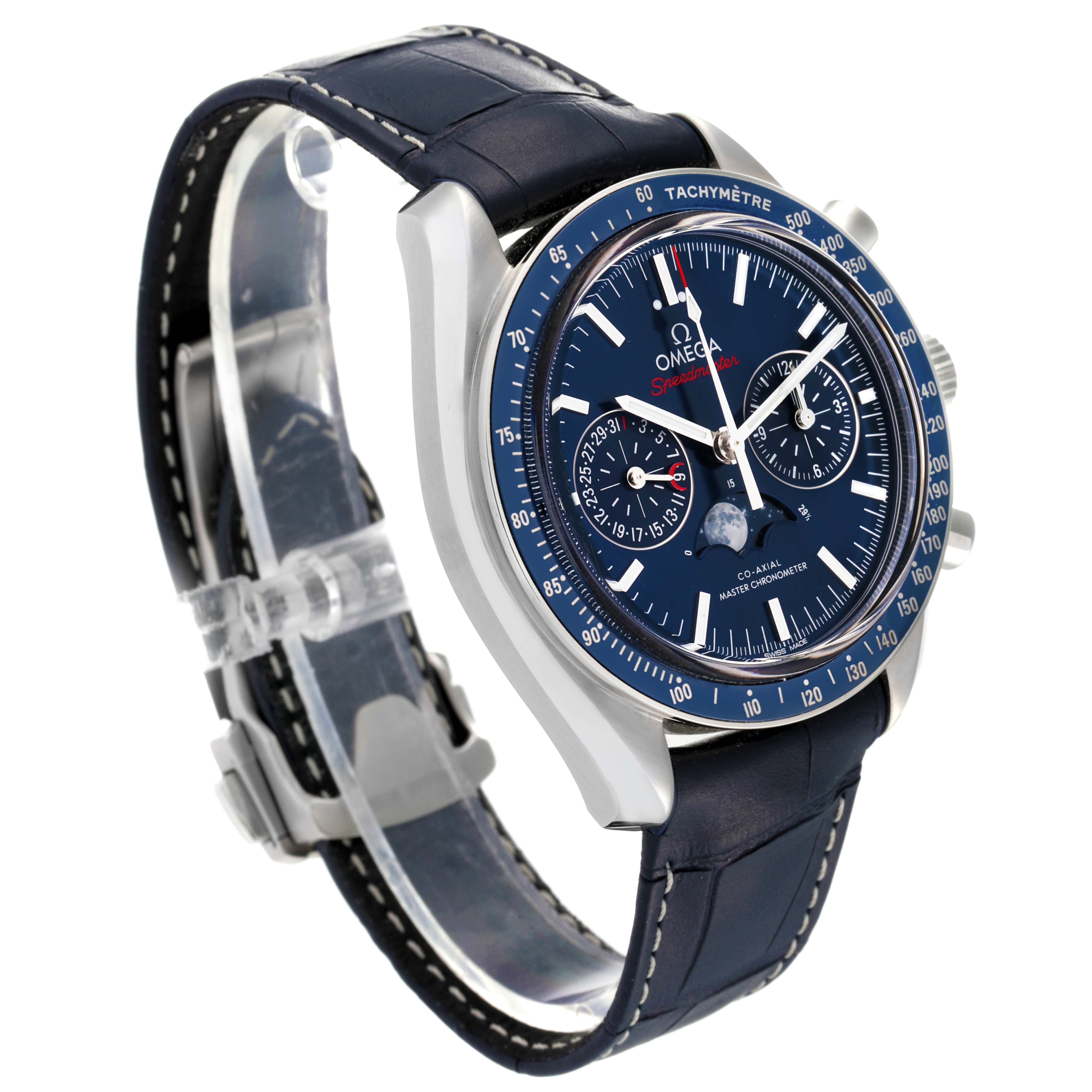 The image shows a side angle view of an Omega Speedmaster 304.33.44.52.03.001 Men's Stainless Steel Blue Dial 304.33.44.52.03.001 Men's Stainless Steel Blue Dial watch, featuring the dial, tachymeter, and leather strap.