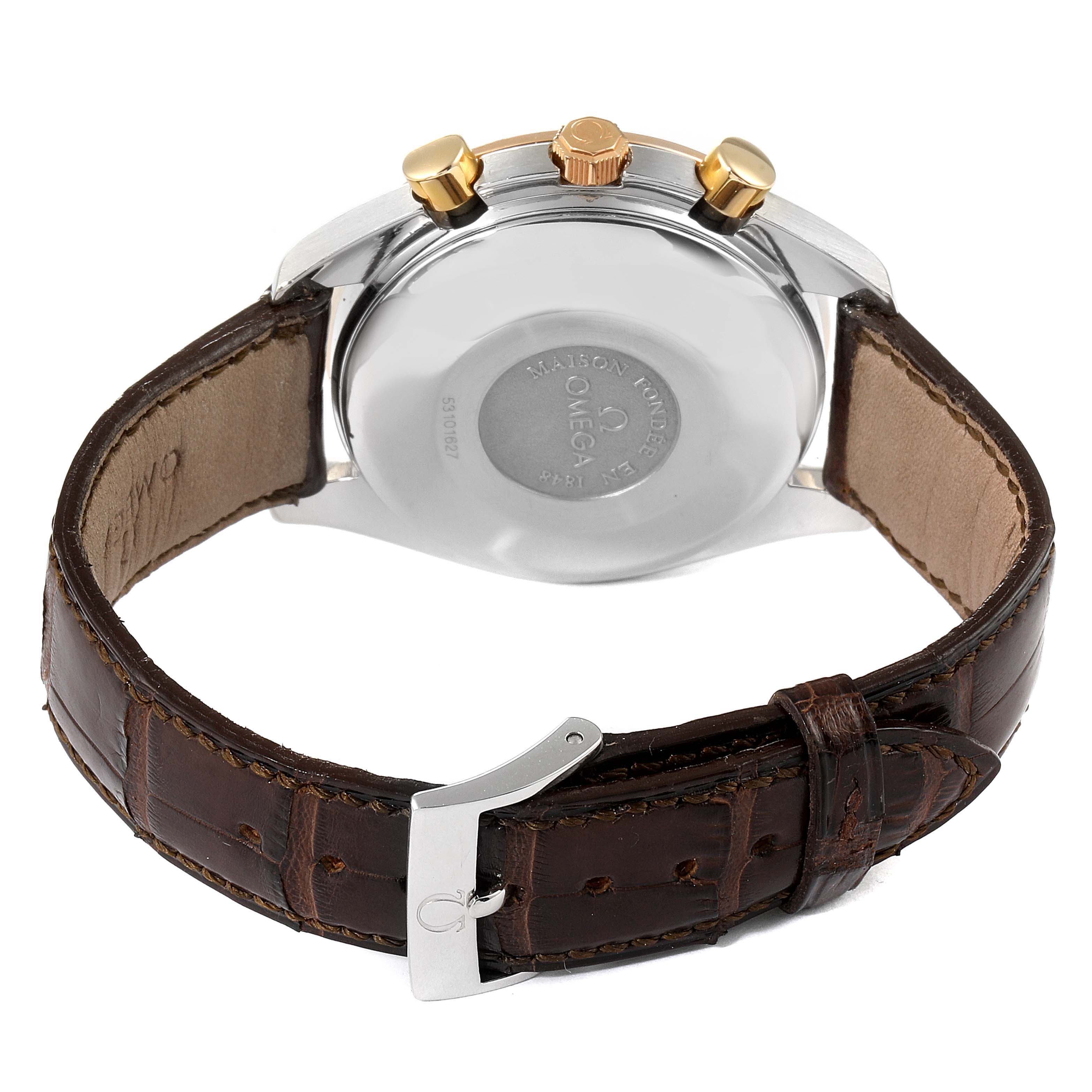 This image shows the back view of an Omega Speedmaster Men's Steel and Gold (two tone) White Dial Men's Steel and Gold (two tone) White Dial watch, highlighting its case, leather strap, and buckle.
