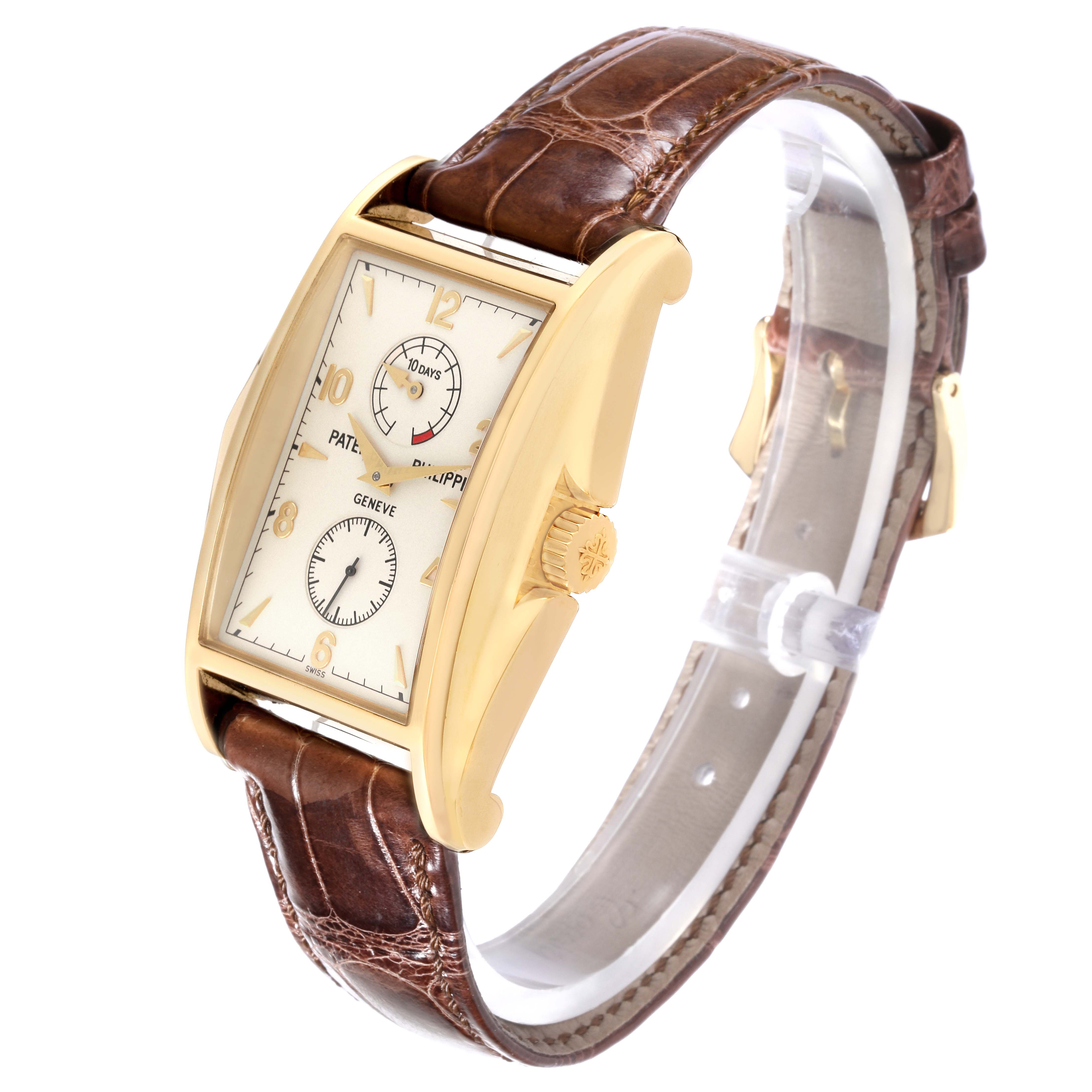 The image shows a Patek Philippe Gondolo 5100J -001 Men's Yellow Gold Silver Dial 5100J -001 Men's Yellow Gold Silver Dial model watch at a three-quarter angle highlighting its face, golden case, and brown leather strap.