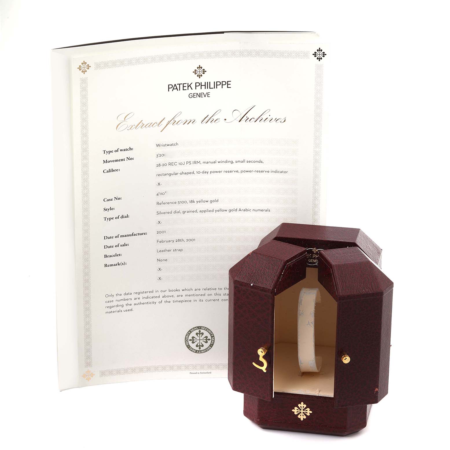 The image shows the Patek Philippe Gondolo 5100J -001 Men's Yellow Gold Silver Dial 5100J -001 Men's Yellow Gold Silver Dial watch in a closed wooden case with an accompanying certificate in the background.