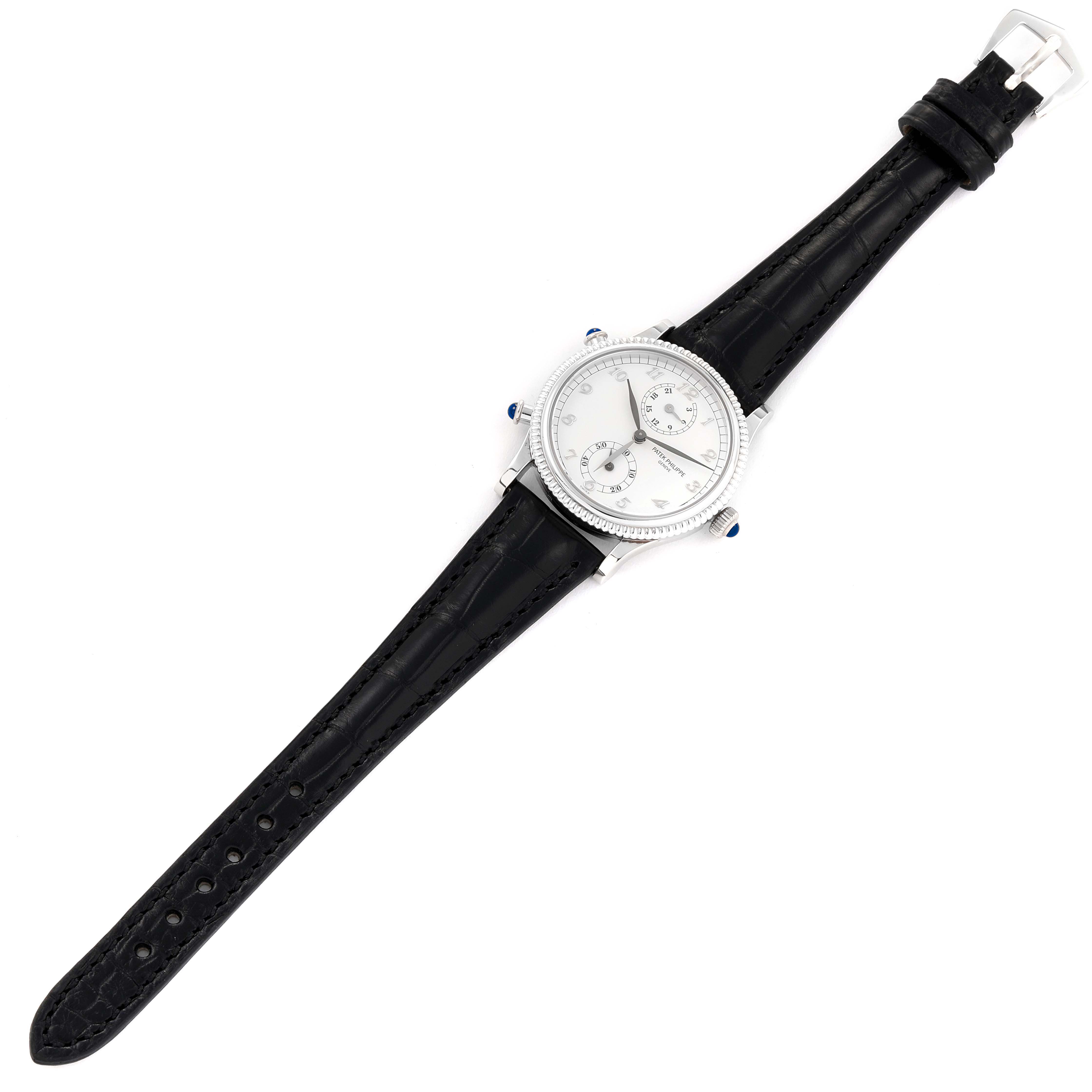 This image shows a top-down view of a Patek Philippe Calatrava 4864G Women's White Gold White Dial 4864G Women's White Gold White Dial watch, displaying its face, case, and black leather strap.