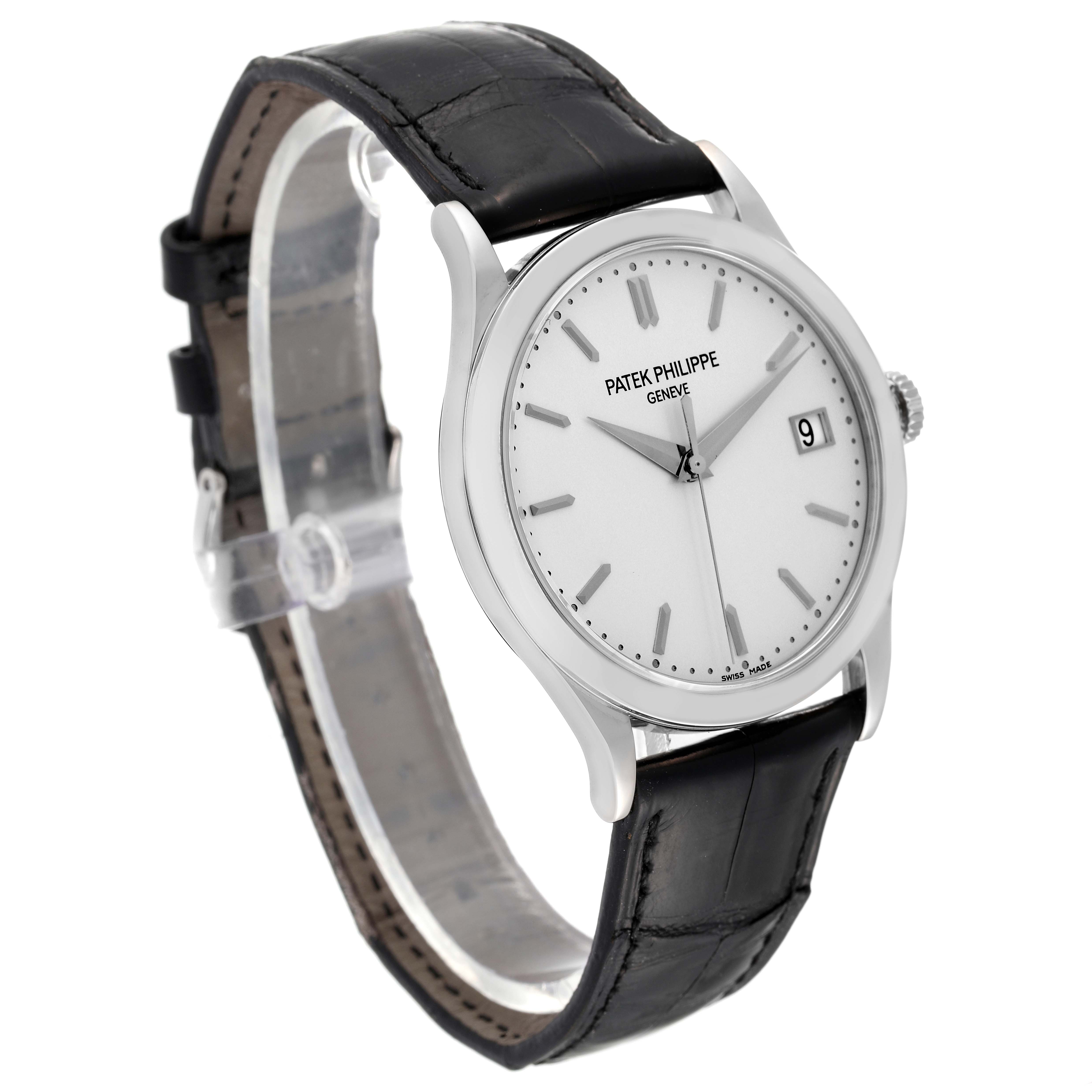 The image shows a Patek Philippe Calatrava 5296G-010 Men's White Gold Silver Dial 5296G-010 Men's White Gold Silver Dial watch from an angled front view, displaying its dial, case, and leather strap.