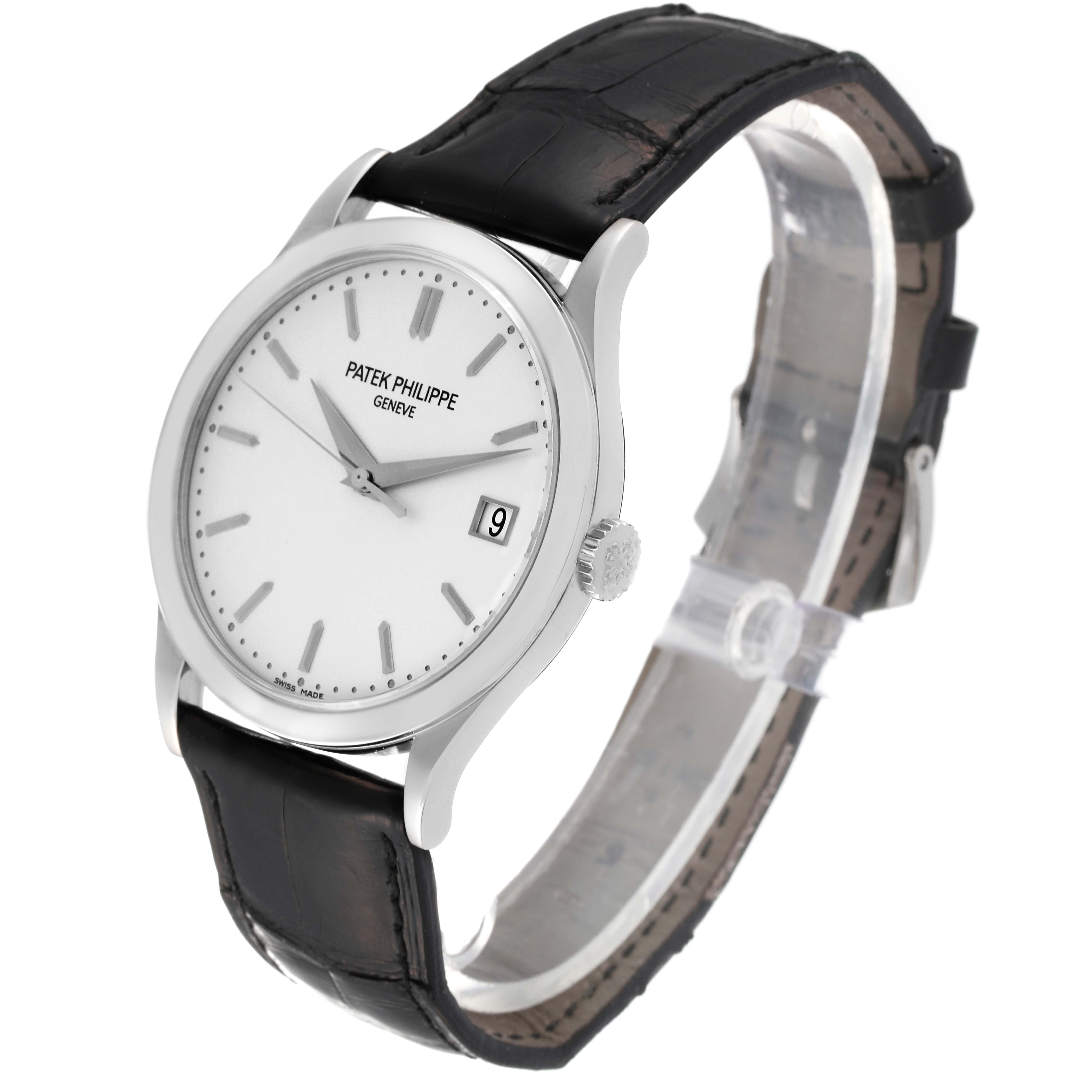 The image shows a Patek Philippe Calatrava 5296G-010 Men's White Gold Silver Dial 5296G-010 Men's White Gold Silver Dial watch angled to display the face, bezel, crown, and leather strap.